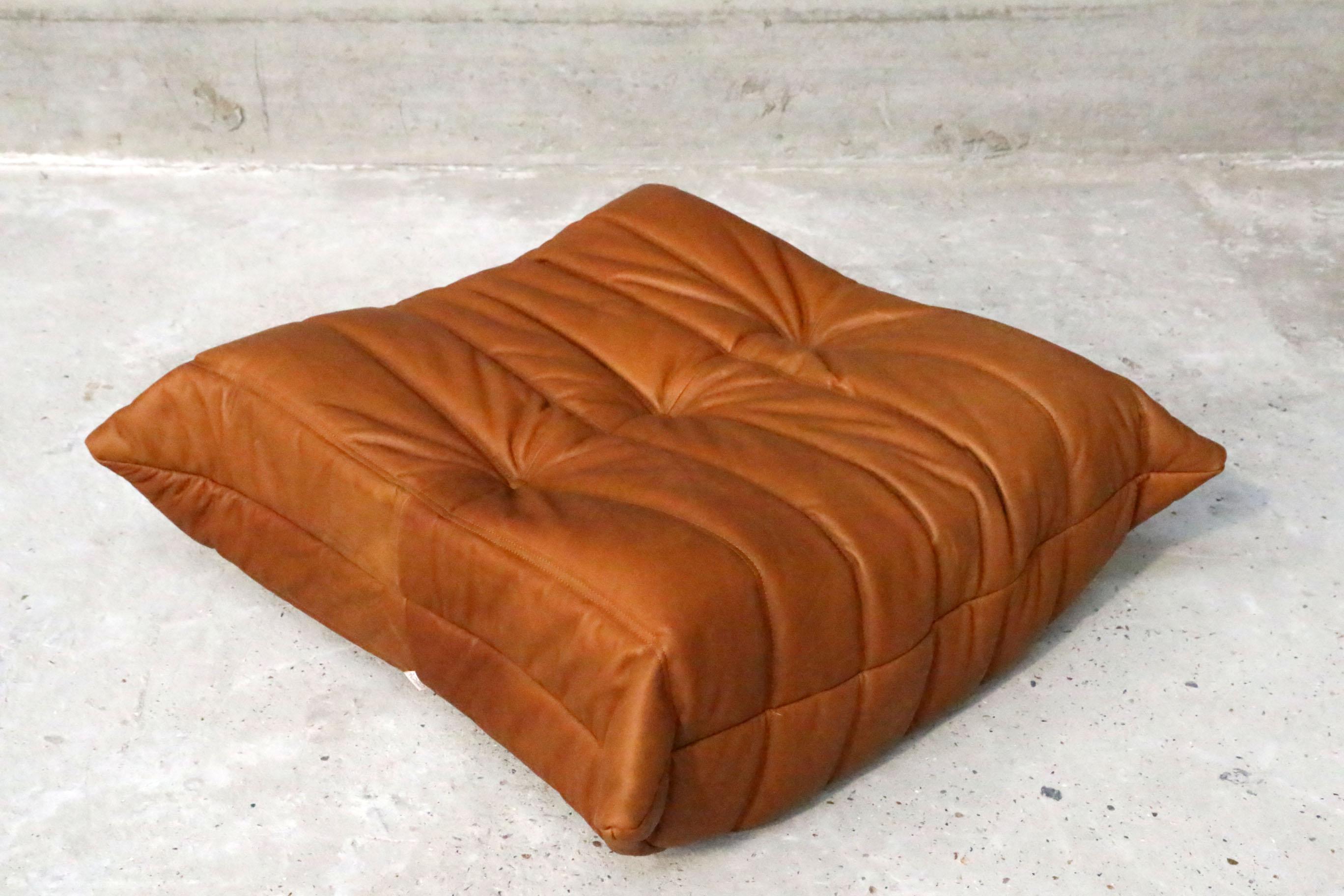 Iconic French vintage pouf, beautifully reupholstered with our signature full grain cognac leather.
Original genuine vintage 