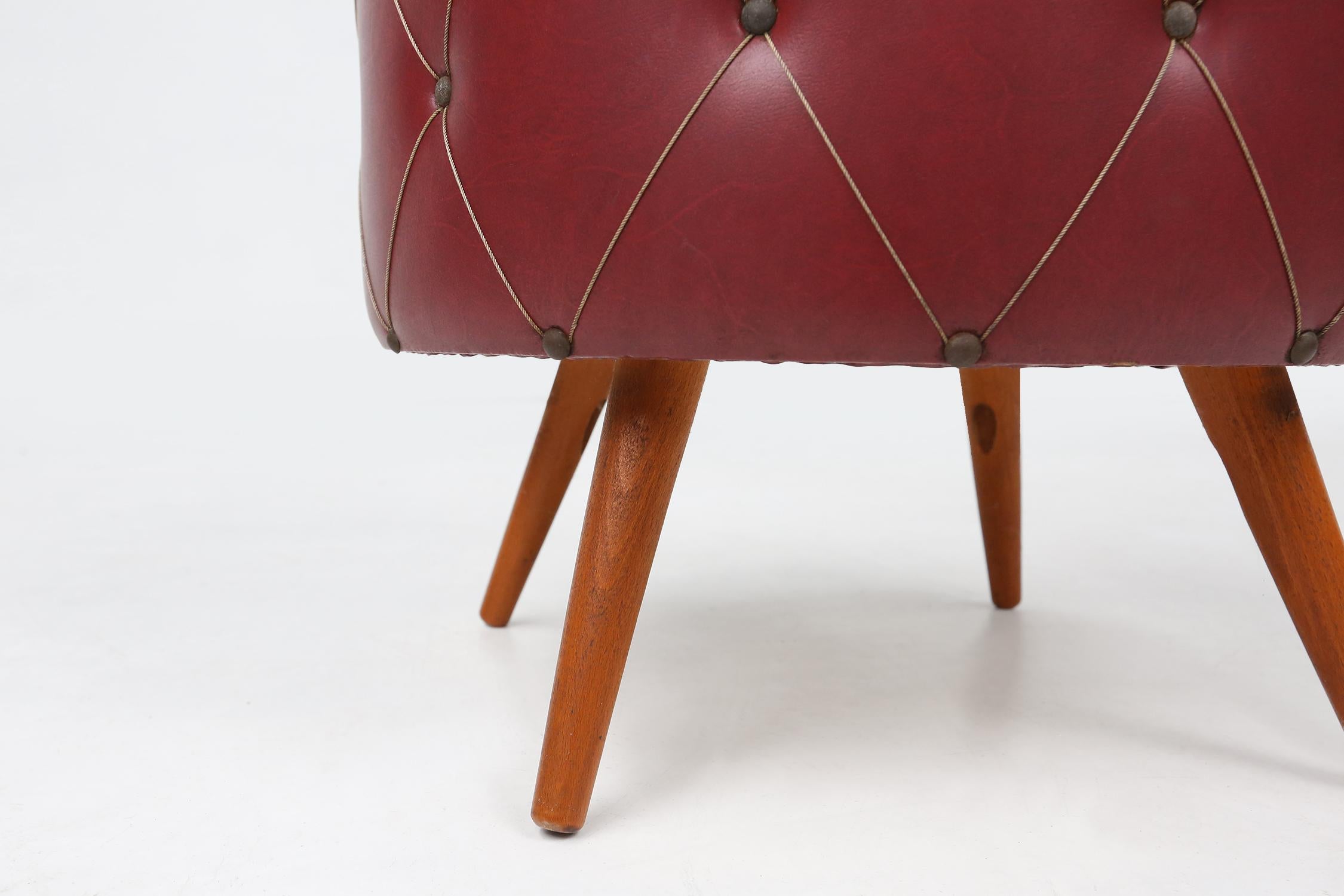 French Vintage pouf with storage in dark red faux leather, France ca. 1950 For Sale