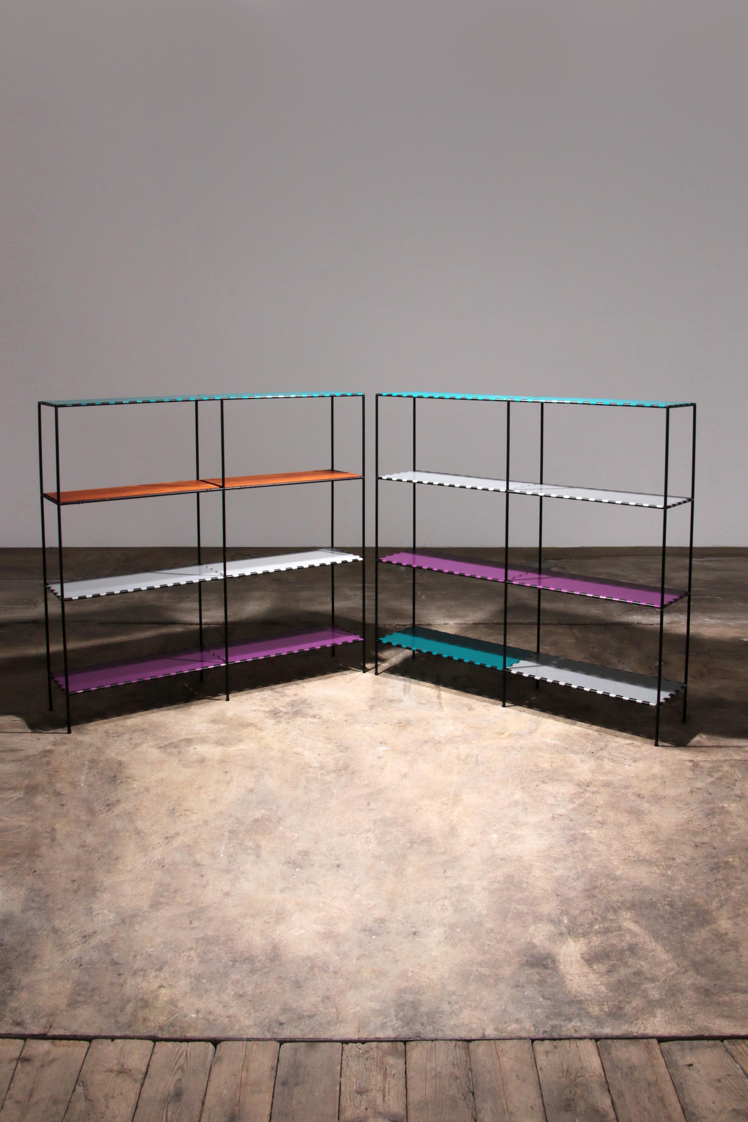 Discover the timeless charm of the Vintage Poul Cadovius Abstracta Wall Furniture set from the 1960s. This unique set of two open presentation racks was designed by the legendary Poul Cadovius and radiates an authentic retro vibe. The blackened