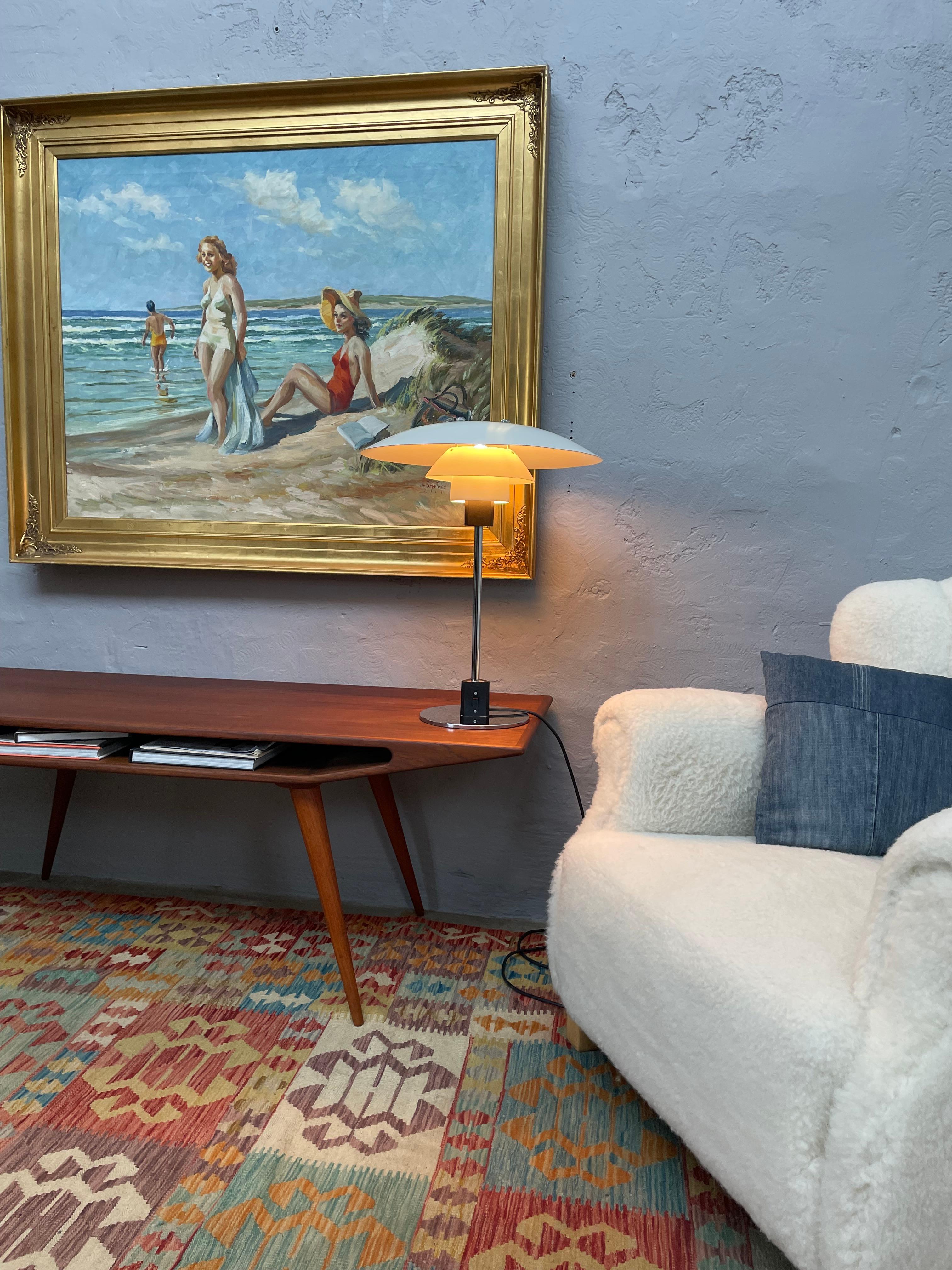 Vintage Poul Henningsen 4/3 table lamp for Louis Poulsen
This is an early PH 4/3 table lamp with a bakelite E27 bulb holder.
In great condition with age related wear and patina on the chrome base and shade. 
Poul Henningsen designed the 3 shade