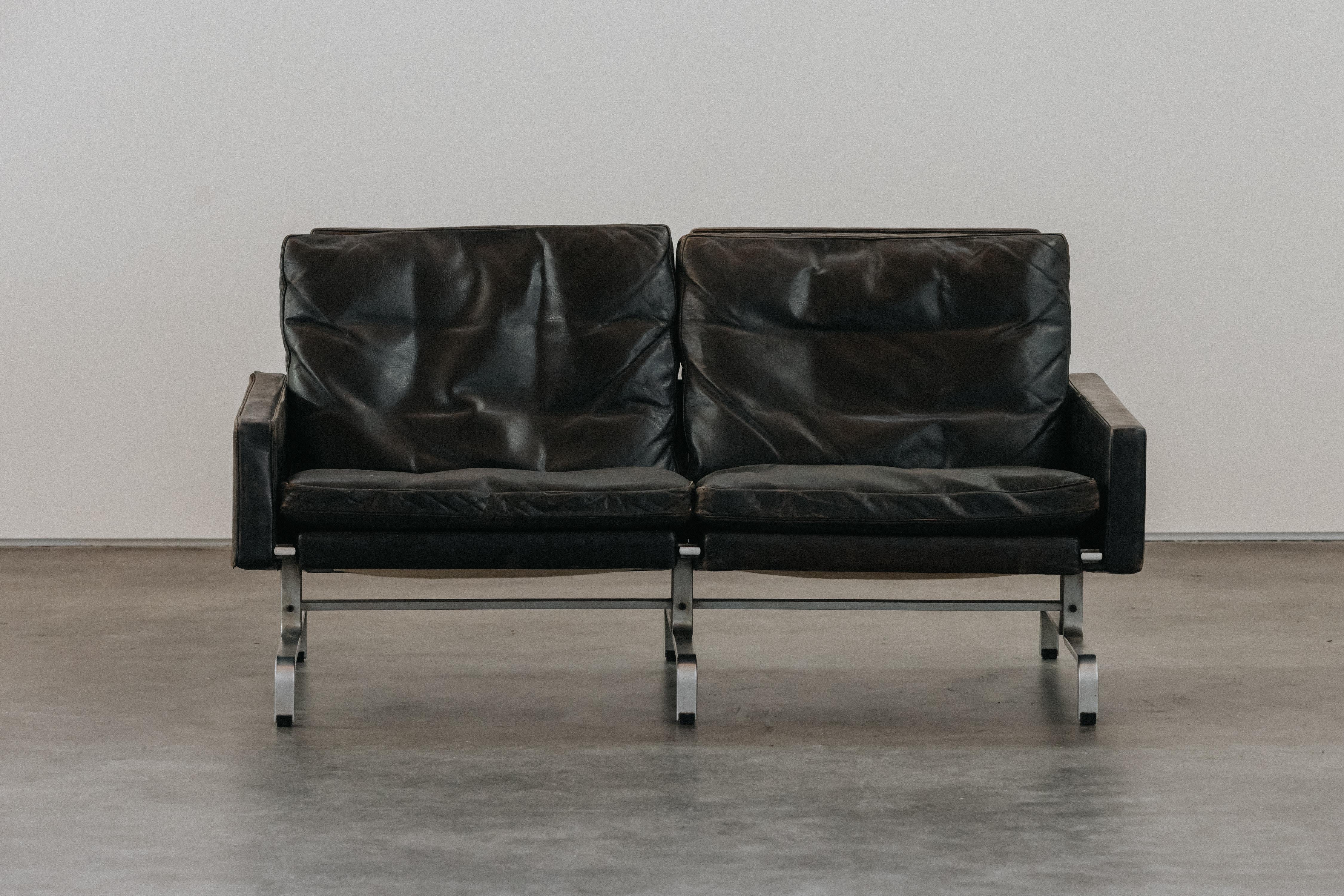 Vintage Poul Kjærholm PK-31/2 Sofa by E. Kold Christensen From Denmark, 1950.  Original black leather upholstery with great patina on a solid chrome base.