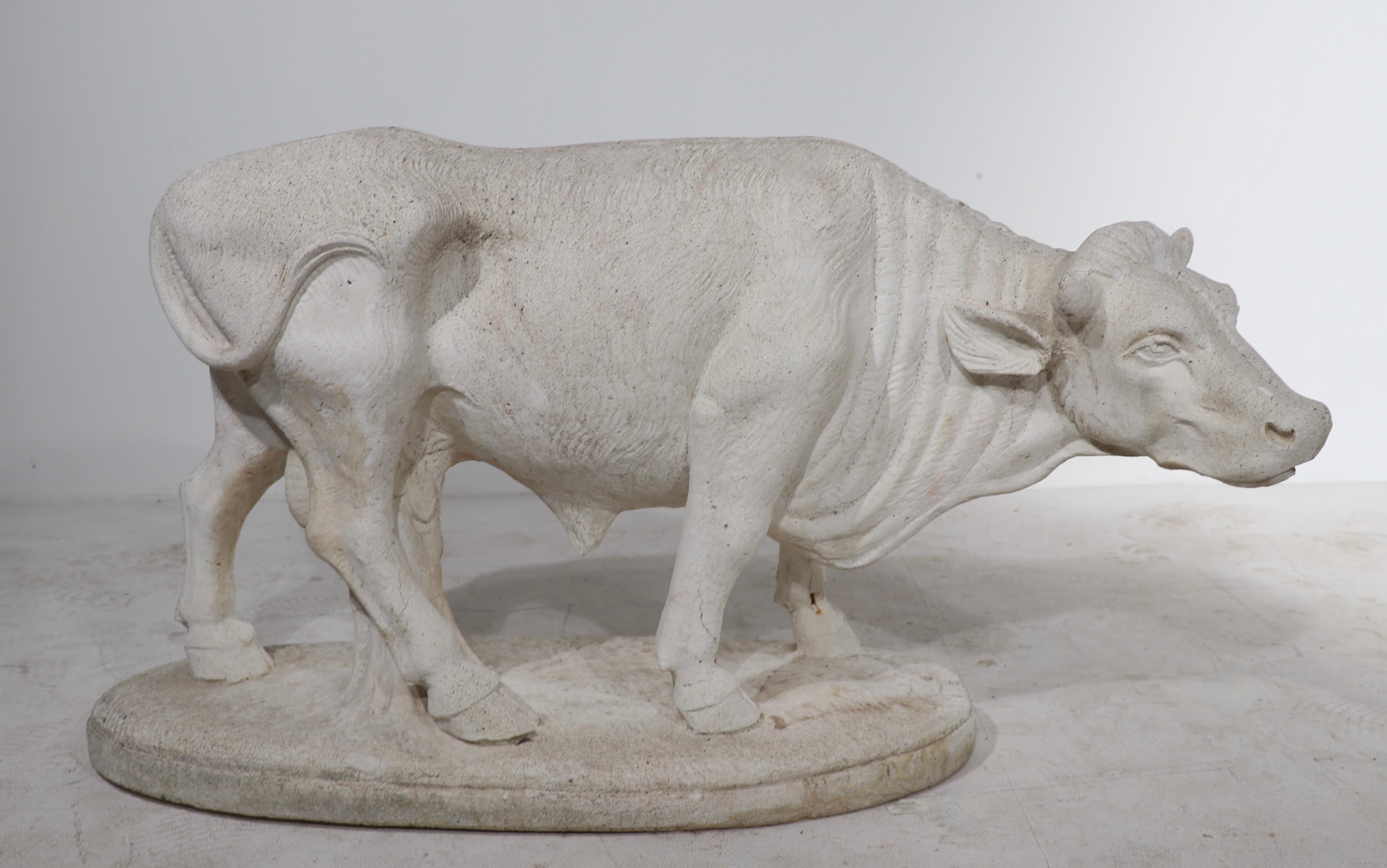 Well detailed poured stone bull statue. We believe this item was originally placed in a shop in France, perhaps a butcher shop, as display. It appears as though the piece was never placed outdoors, hence the interesting white color. Great object