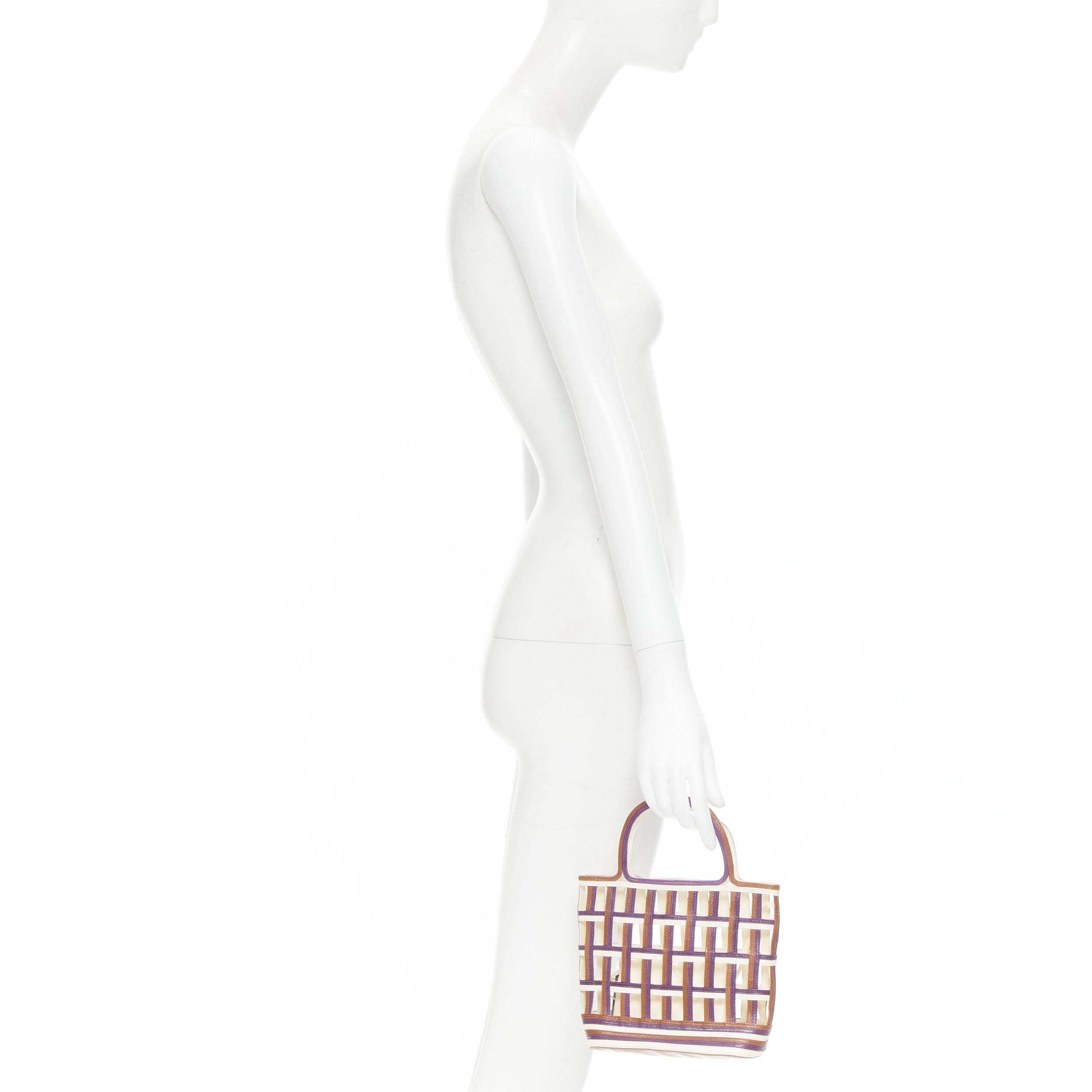 vintage PRADA purple brown cream lattice open weave mini top handle bag 
Reference: TGAS/B01382 
Brand: Prada 
Designer: Miuccia Prada 
Model: Lattice leather bag 
Material: Leather 
Color: Brown 
Pattern: Solid 
Extra Detail: Attached Prada