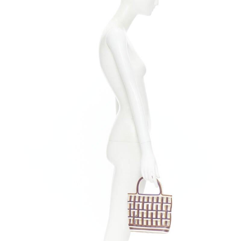 vintage PRADA purple brown cream lattice open weave mini top handle bag
Reference: TGAS/B01382
Brand: Prada
Designer: Miuccia Prada
Model: Lattice leather bag
Material: Leather
Color: Brown, Purple
Pattern: Solid
Lining:  Leather
Extra Details: