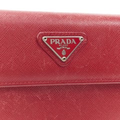 vintage PRADA red saffiano leather triangular plaque flap wallet