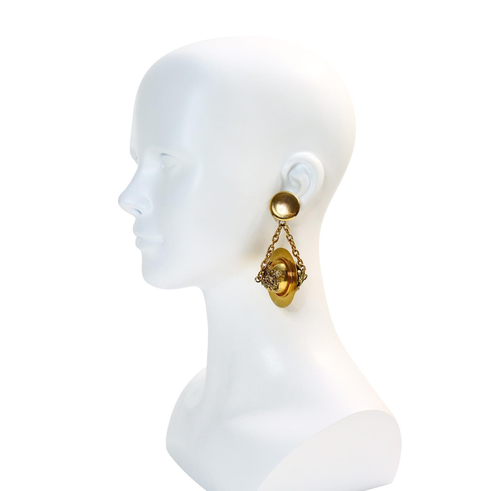Vintage Premiere Etage Paris Dangling Gold Tone Globe Earrings. These fall from a double chain side facing on a smooth surface and then the textured part represents the portions of the globe. These are like something I have never seen.  Quite