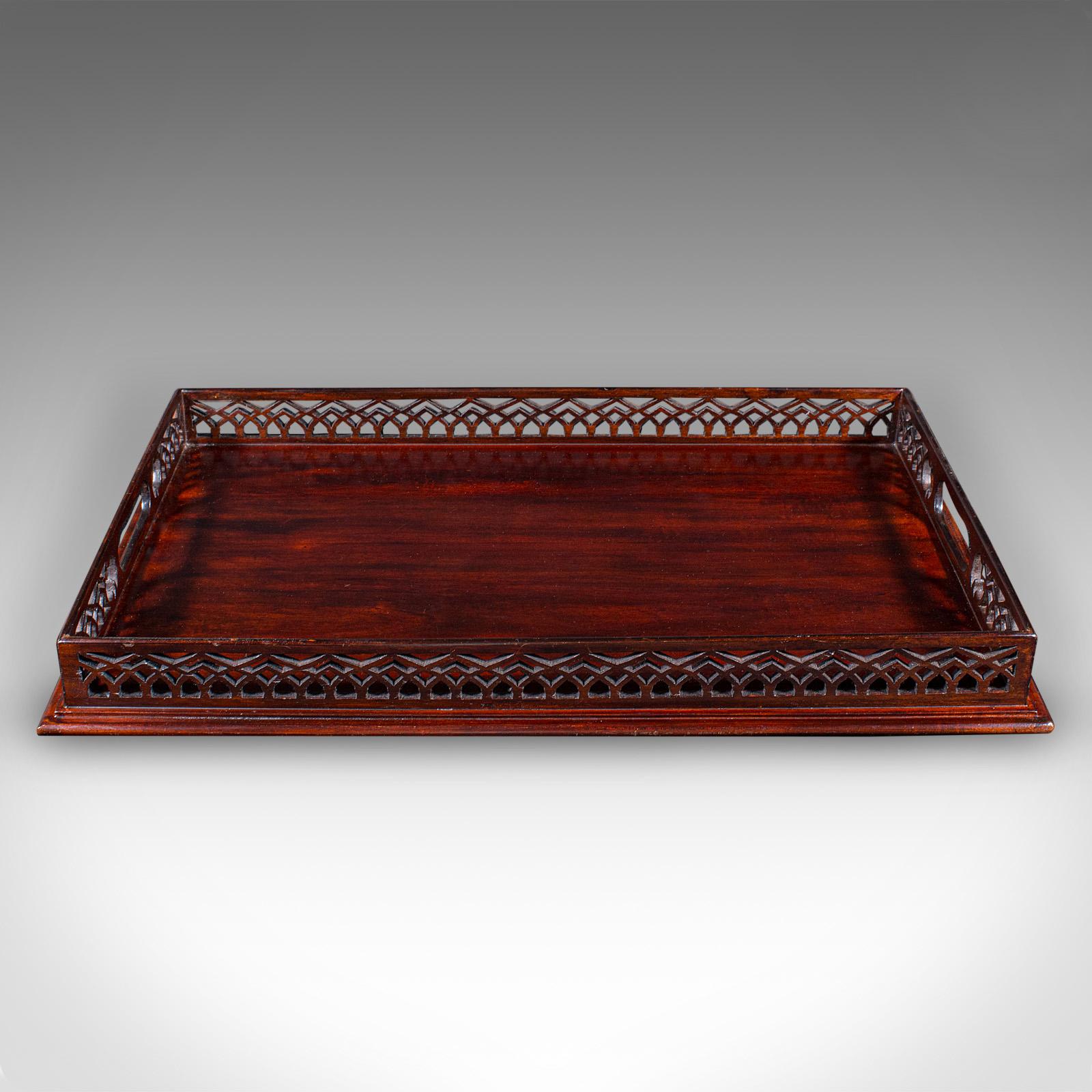 This is a vintage presentation serving tray. An English, mahogany afternoon tea or aperitif server in Regency revival taste, dating to the late 20th century, circa 1980. Handsome in proportion with elegant craftsmanship, ideal for entertaining with