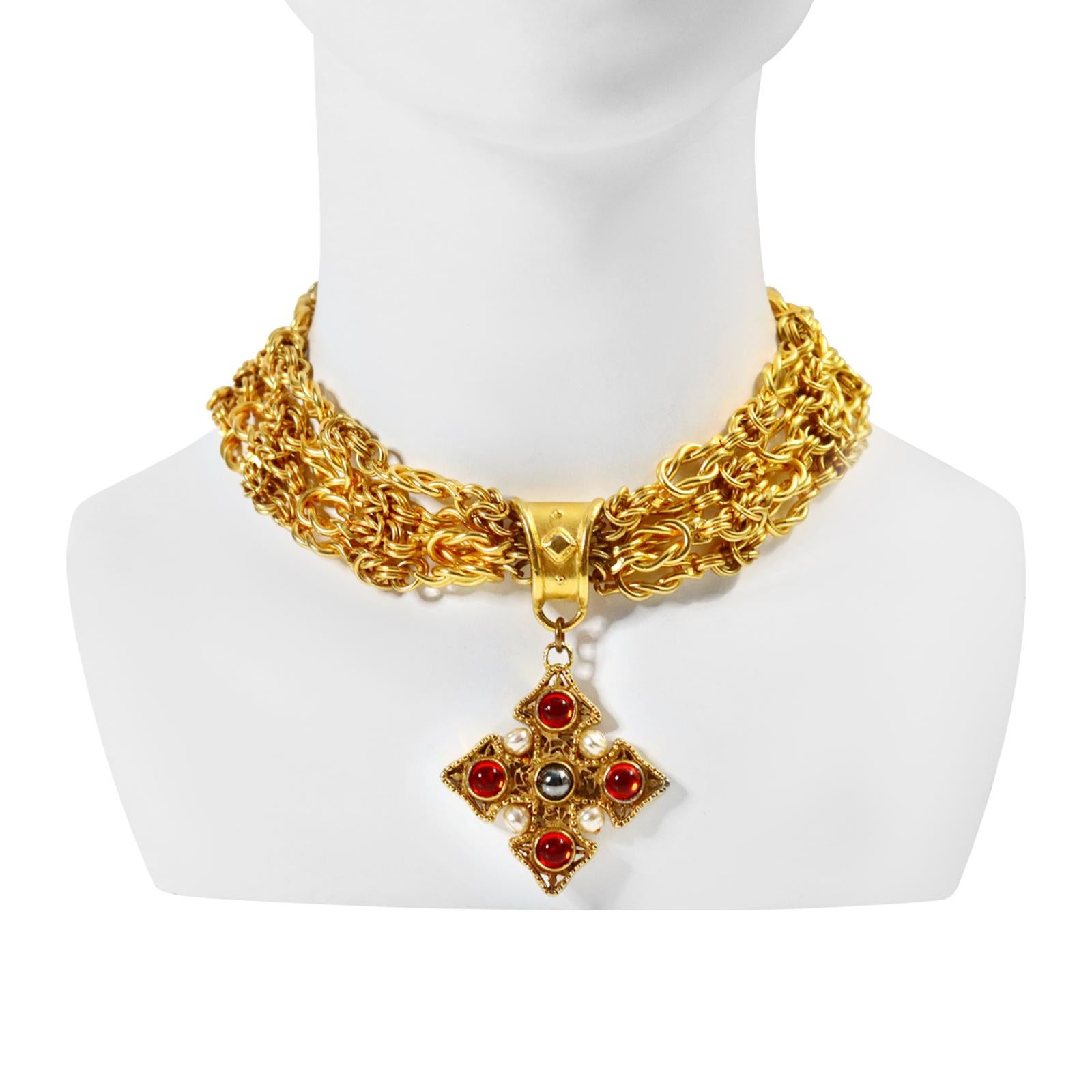 Vintage Prevost Gold Tone 4 strand Choker Necklace with Dangling Maltese Cross. There are 4 heavy link chains that make this necklace up with a piece that has faux pearls and red and black shiny cabochons.  Quite substantial.  Really makes a