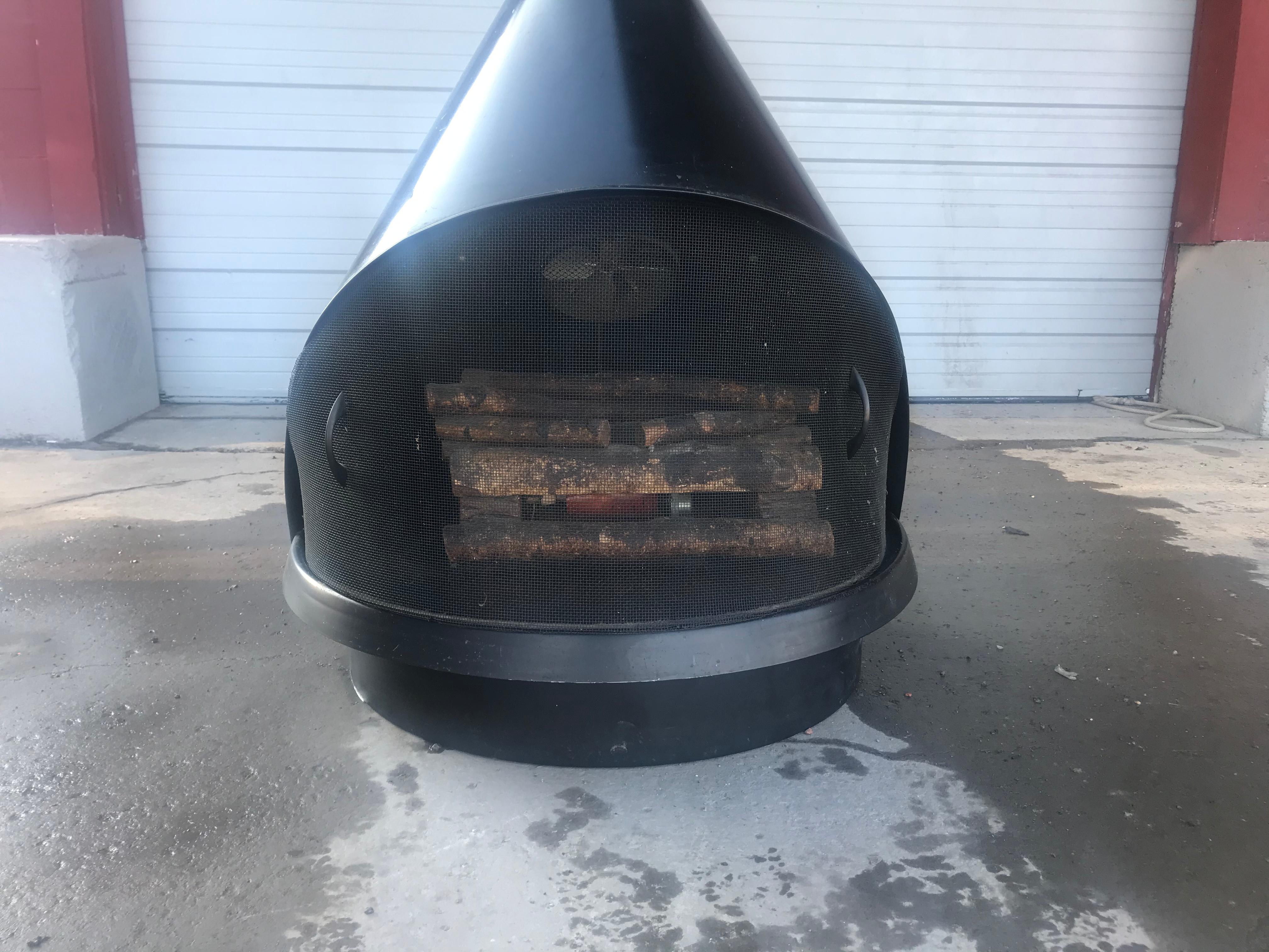 Vintage Preway Mid-Century Modern cone electric fireplace, iconic design, original black finish. Complete with heat element, logs and fan, tested and working perfectly, adjustable height from 72