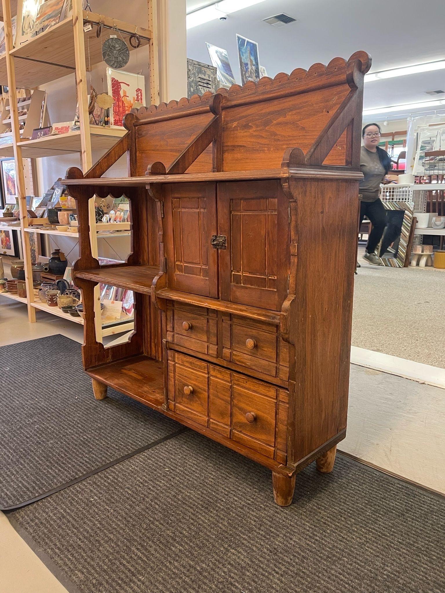 Vintage Primitive Arts and Craft Style Carved Wood Bookshelf and Storage Cabinet In Good Condition For Sale In Seattle, WA
