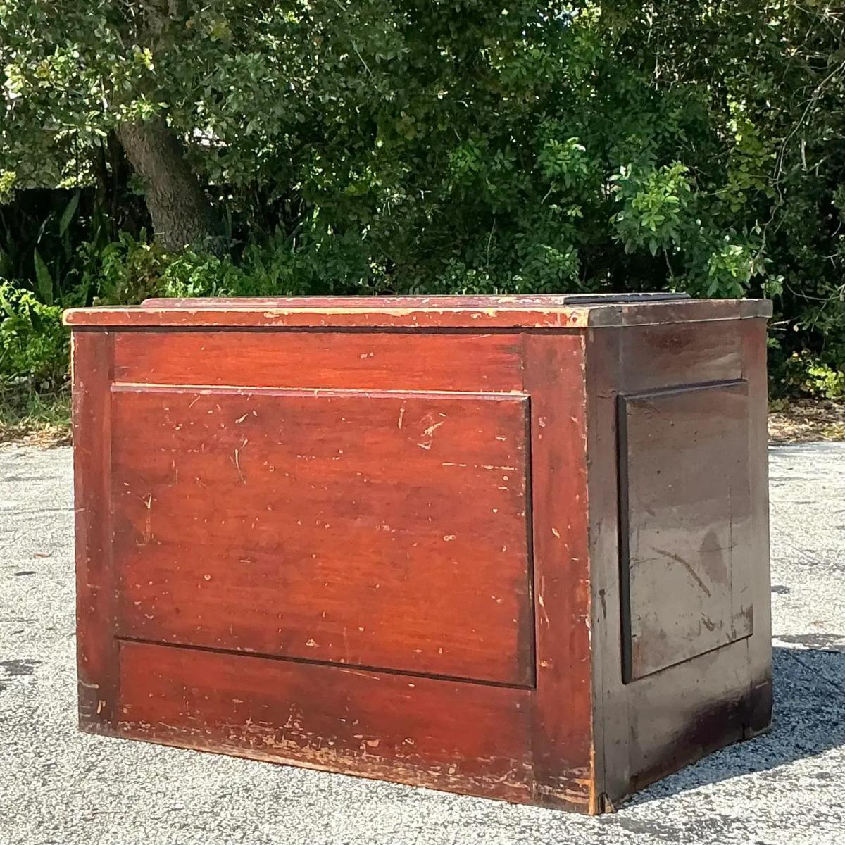 Capture the rustic charm of yesteryear with this vintage primitive blanket chest. Crafted with a simple, robust design, it showcases the raw beauty of aged wood, full of character and history. Perfect for storing blankets, linens, or keepsakes, this