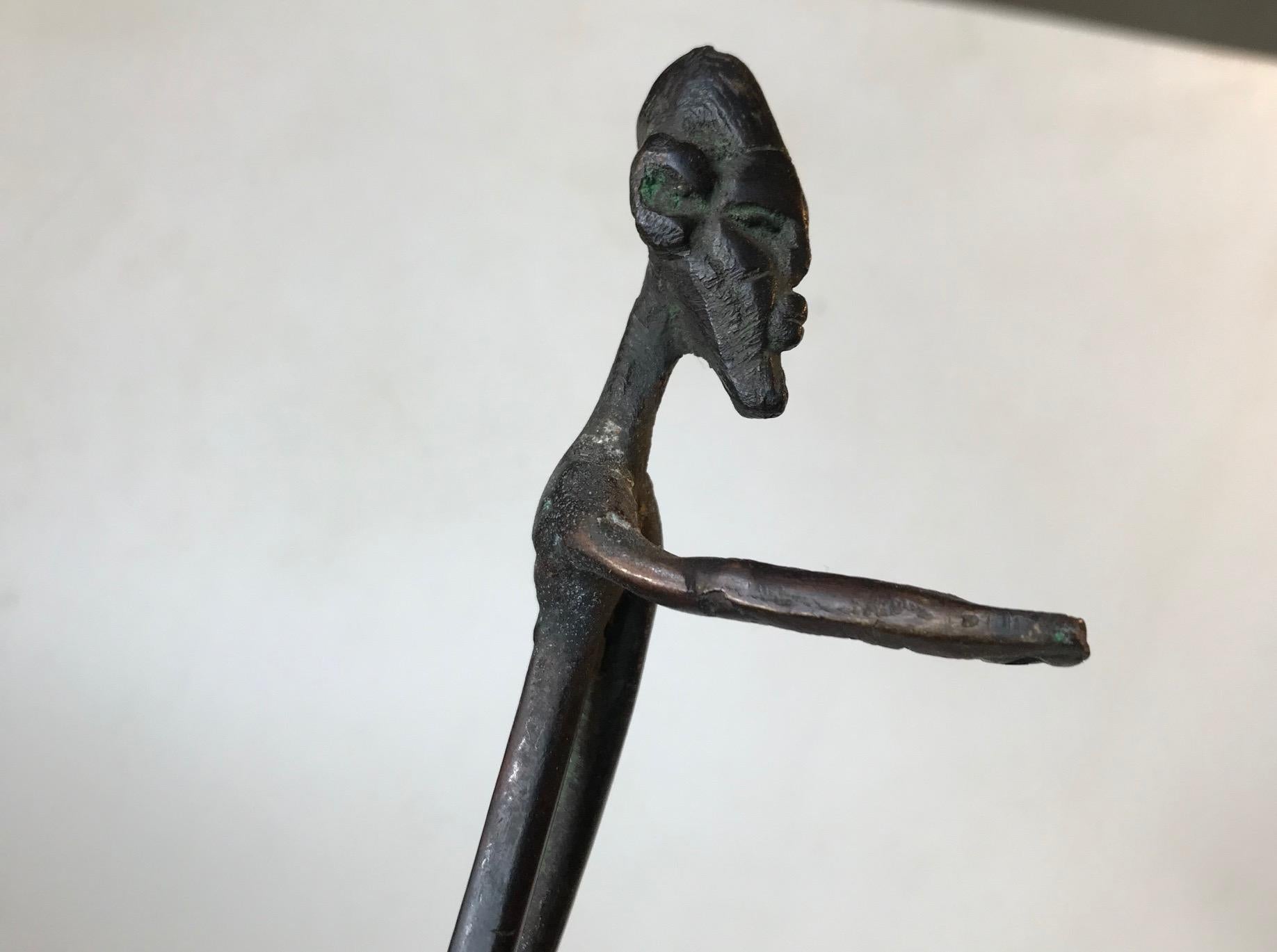Late 20th Century Vintage Primitive, Lean and Tall African Bronze Sculpture