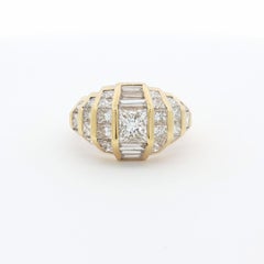 Anillo vintage con diamantes de talla princesa y baguette, de oro amarillo de 18 quilates