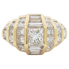 Anillo vintage con diamantes de talla princesa y baguette, de oro amarillo de 18 quilates