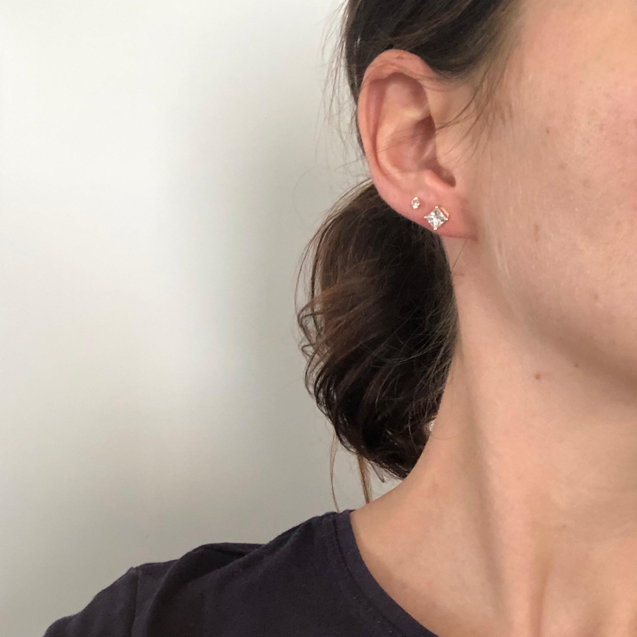 princess cut diamond earrings on ear