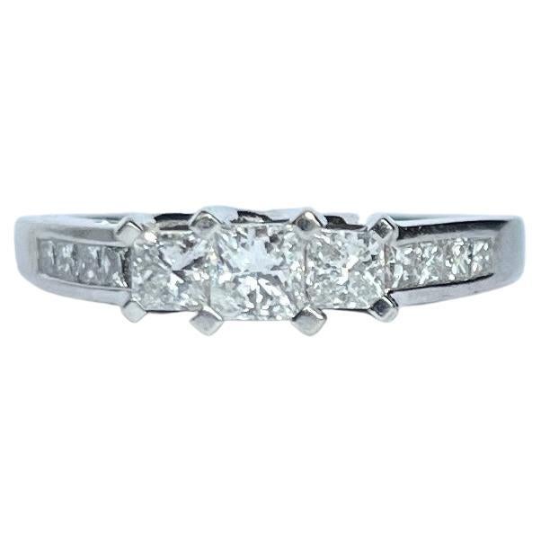 Vintage Princess Cut Diamond and Platinum Three Stone Ring For Sale