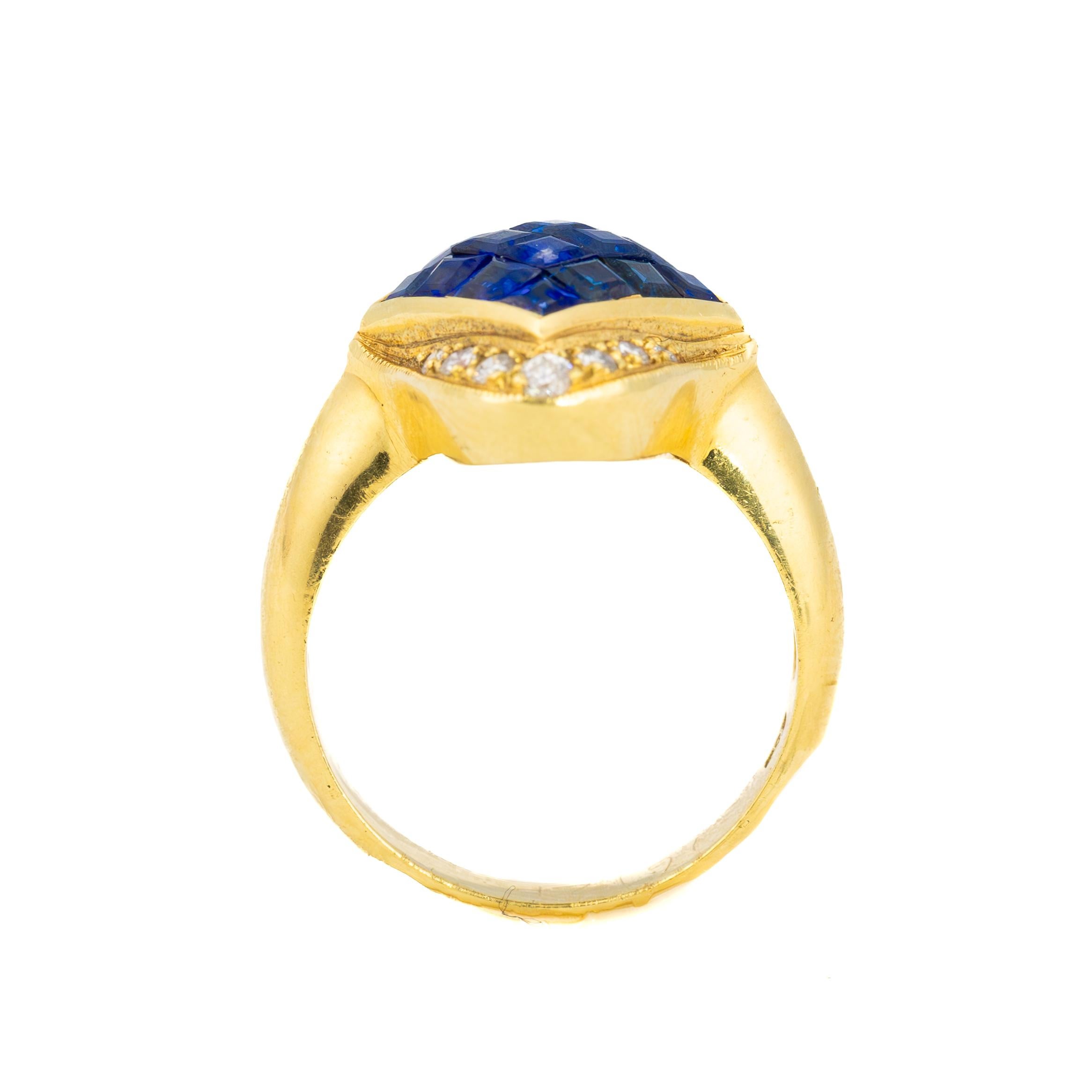 Vintage Princess Cut Sapphire and Diamond Gold Ring

A captivating vintage ring that radiates sophistication, this 18K yellow gold masterpiece showcases a striking geometric arrangement of deep blue sapphires, meticulously invisibly set in a