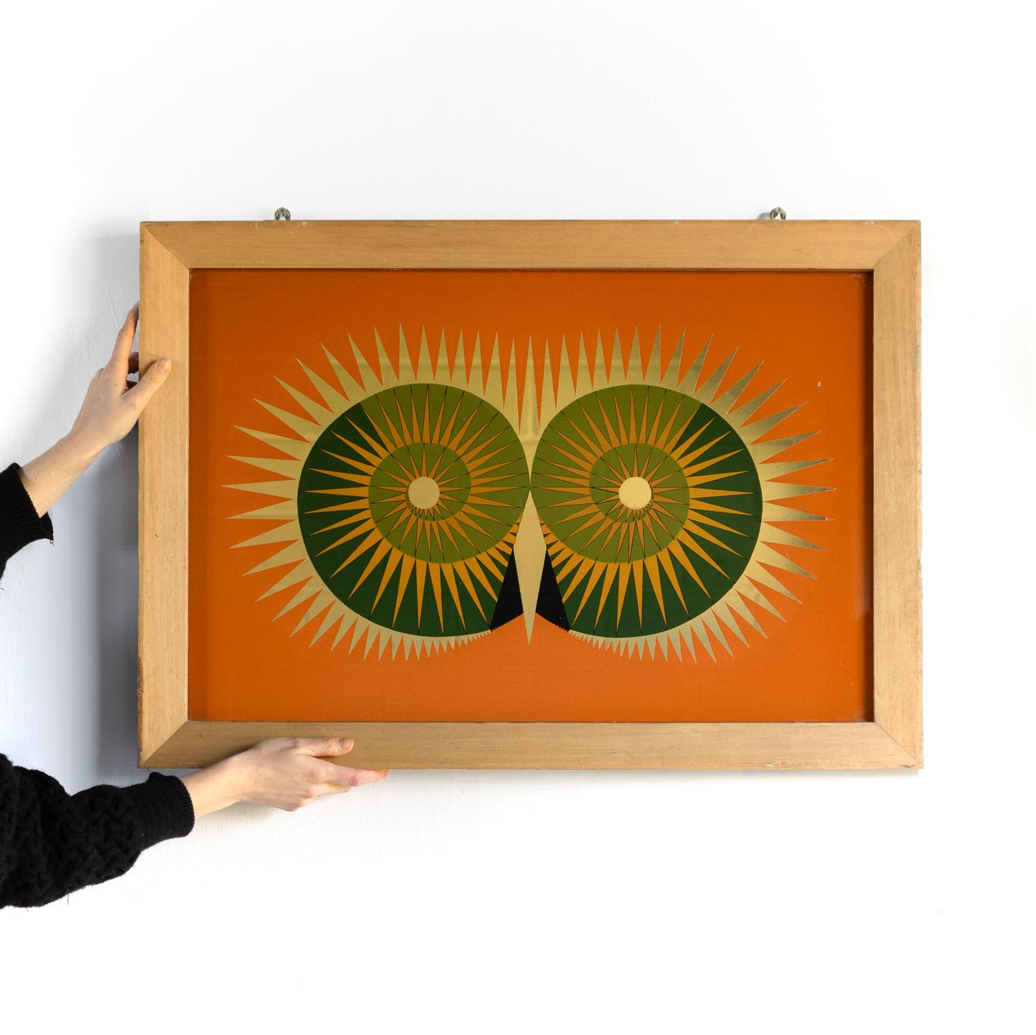 Opera d'arte specchiata del Medioevo

Un pezzo astratto con due cerchi geometrici a spirale con raggi solari spigolosi, che ricordano leggermente le ammoniti o potenzialmente il volto di un gufo. È possibile che l'artista si sia ispirato a uno o a