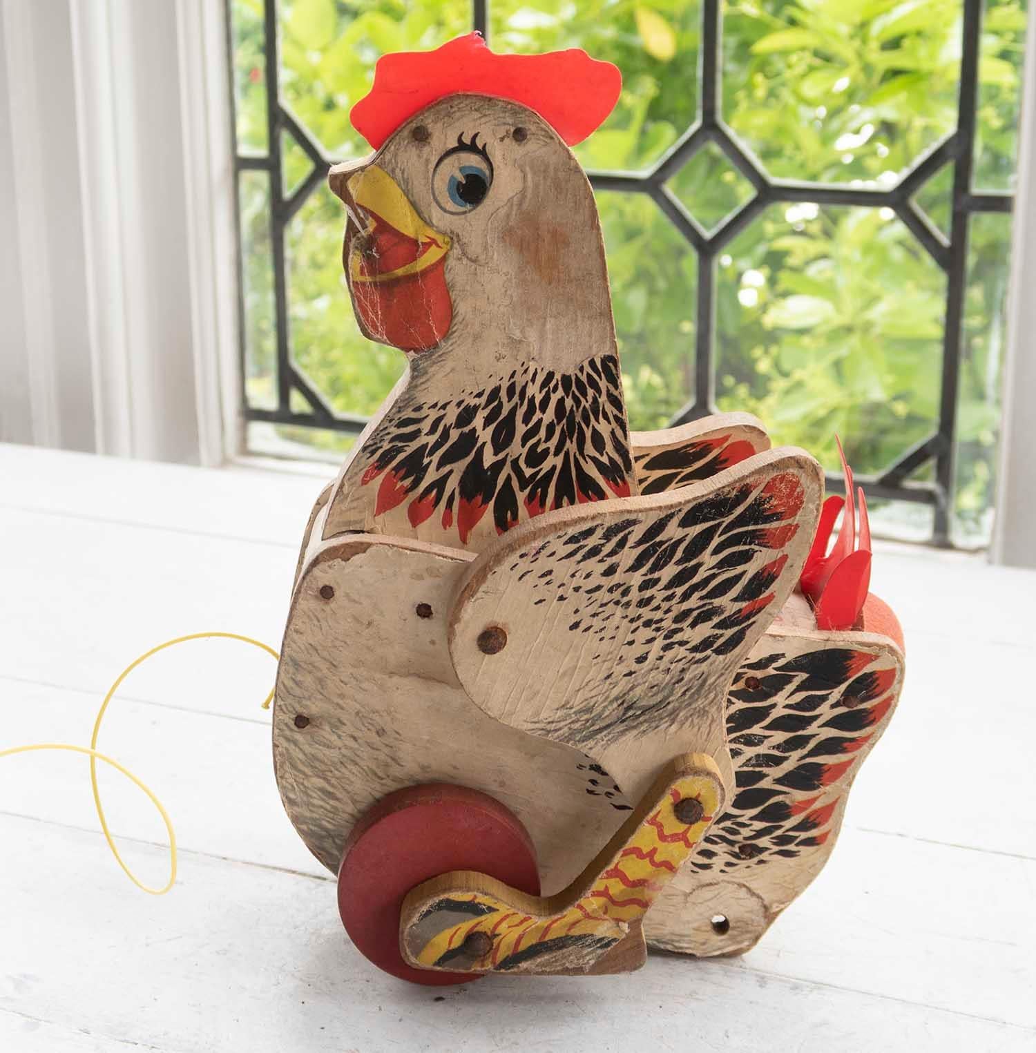 Charming chicken toy figure.

Known as 