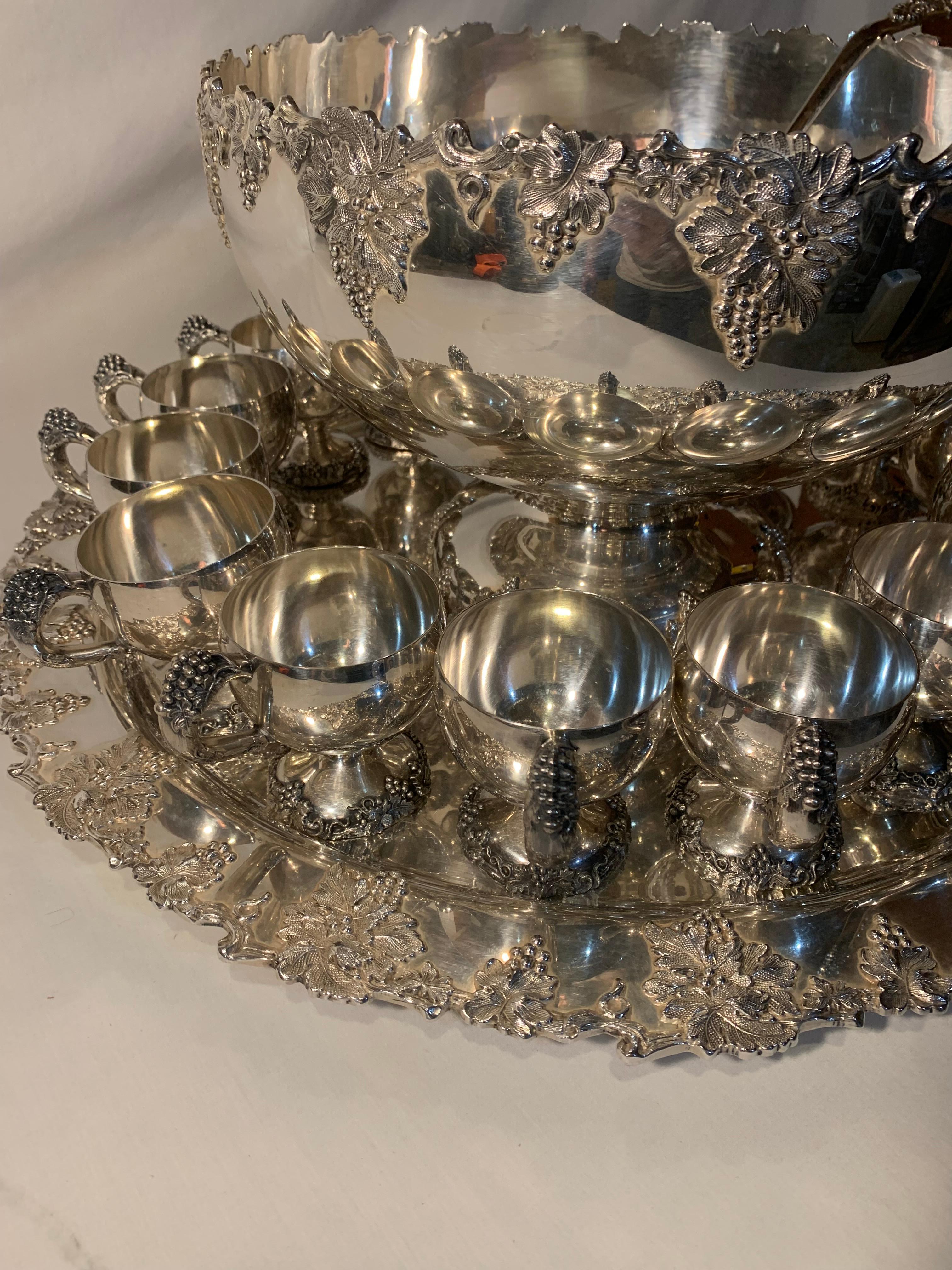 International silver plate Vintage grape punch bowl set with platter, 16 cups & ladle 

Item description

This auction is for an American silver plated punch bowl, platter, cups & ladle by International Silver in the Vintage pattern, grape