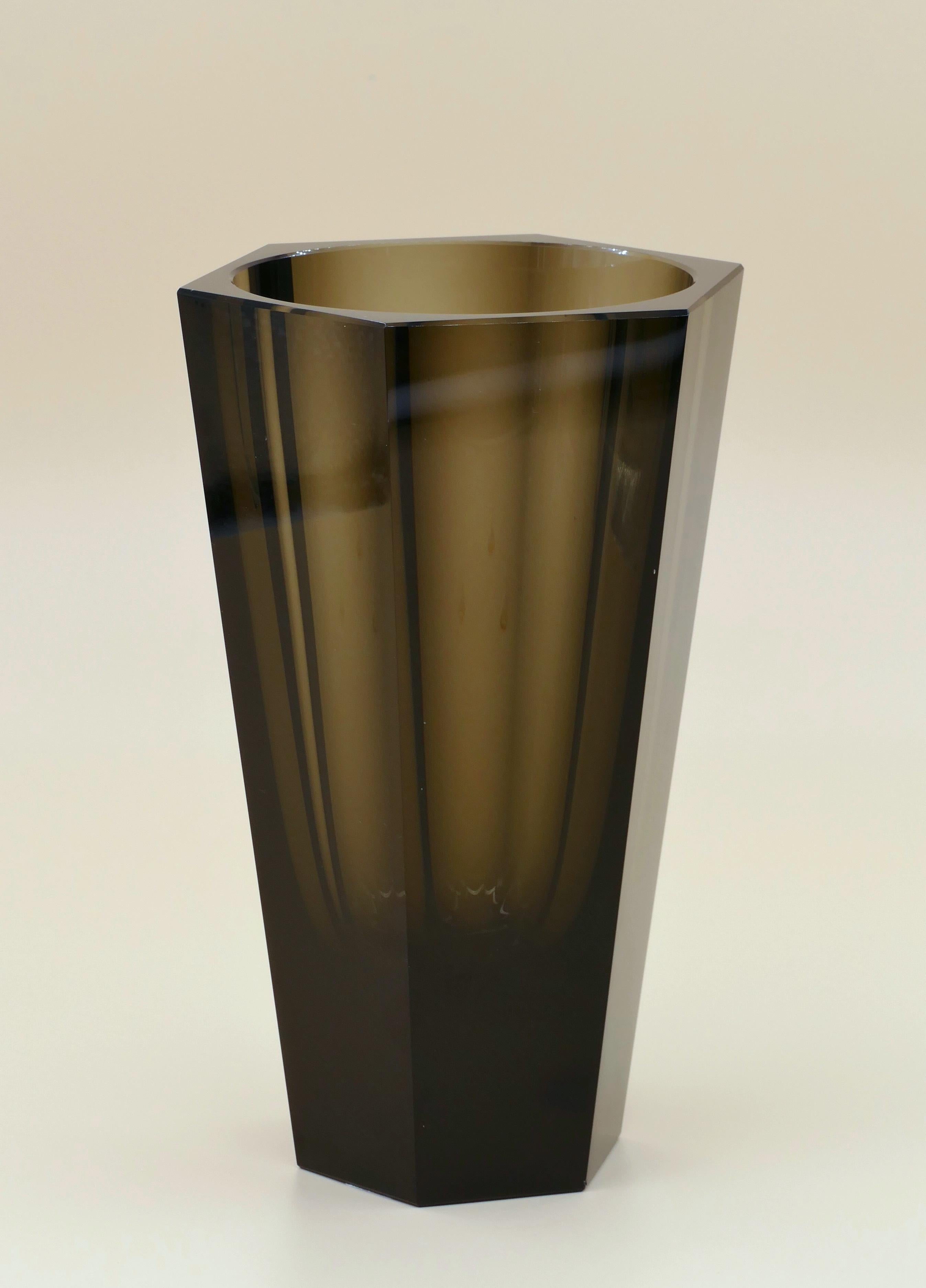 This Purity Moser vase is an original decorative glass vase realized in the 1970s.

This very precious cylindrical gray-colored glass vase is the purity model realized by the famous manufacturer Moser.

Founded in 1857 by Ludwig Moser & Sons,