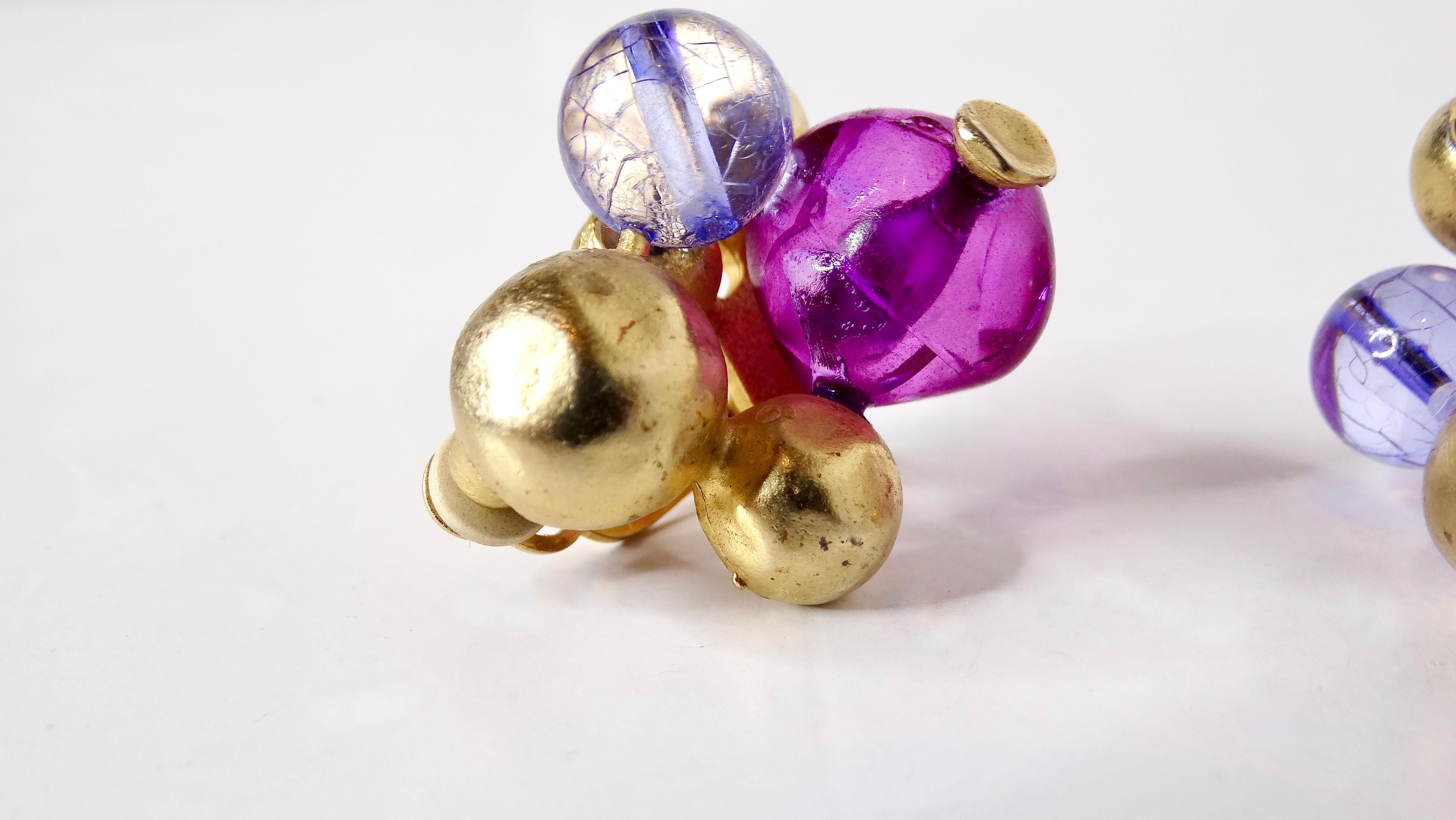 Elevate your jewelry collection with these Vintage Purple Beaded Cluster 14k Gold Plated Clip-On Earrings. A stunning blend of elegance and flair, these earrings feature a vibrant array of purple beads, intricately clustered to create a lavish