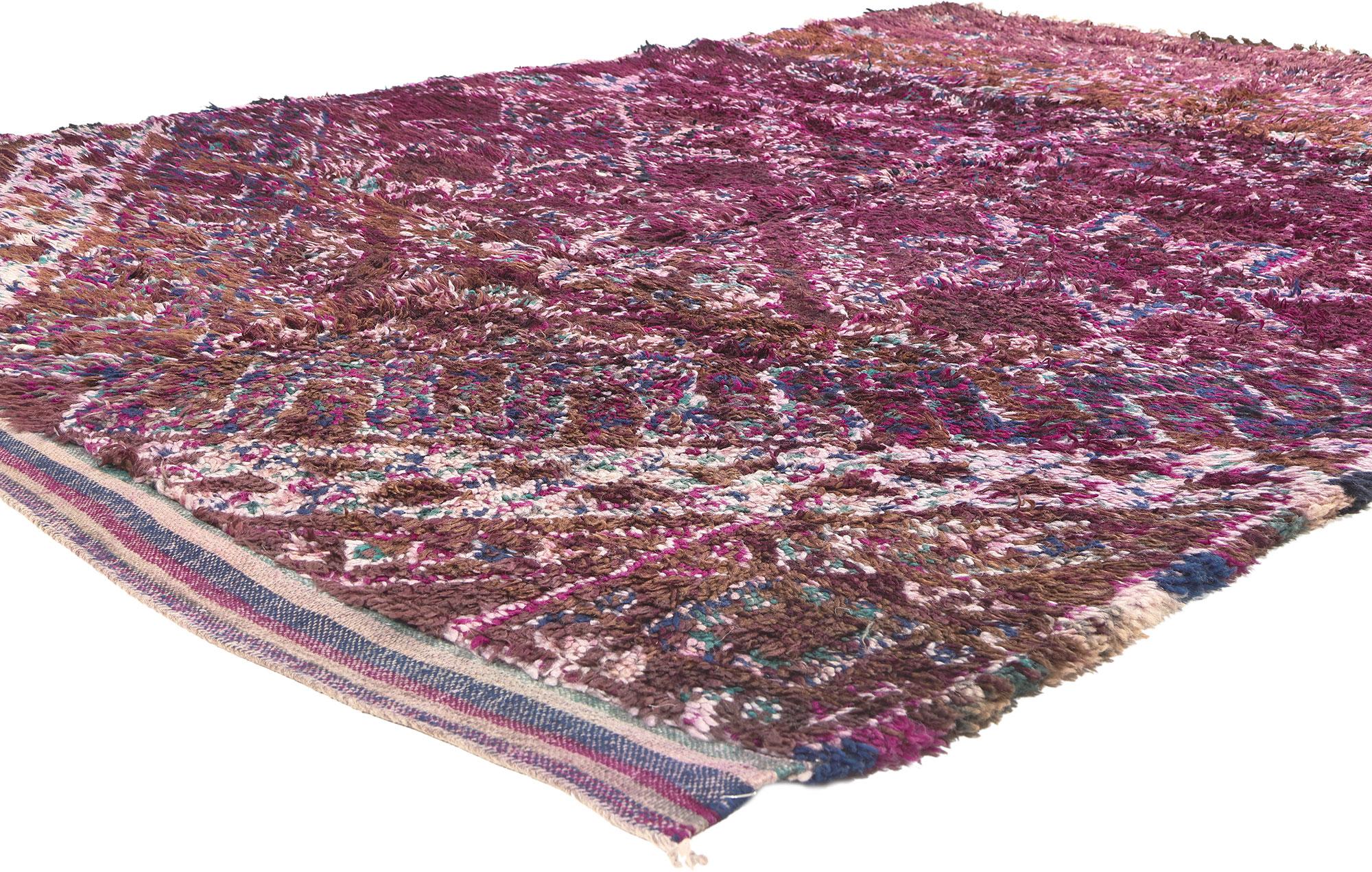 20779 Vintage Purple Beni MGuild Moroccan Rug, 06'00 x 09'06. 

In this luxuriously plush vintage Beni MGuild rug, a delightful fusion of Hygge vibes and Bohemian Tribal style unfolds. The sumptuous hand-knotted wool creates an inviting canvas for