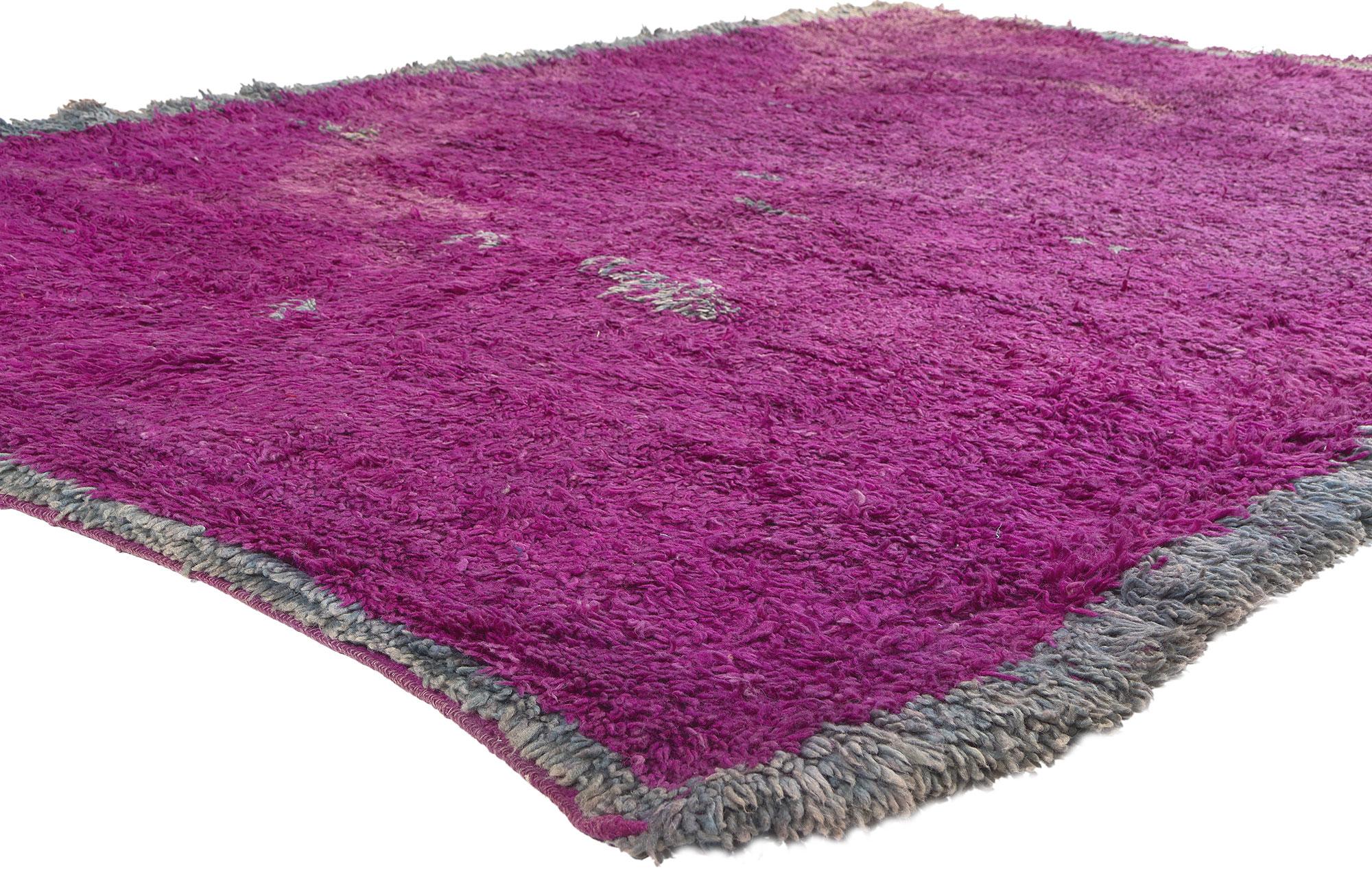20669 Vintage Purple Beni Mrirt Moroccan Rug, 06'08 x 09'05.

Step into the alluring history of this hand-knotted wool vintage Beni Mrirt Moroccan rug, a captivating embodiment of woven beauty intertwined with the rich culture of Berber