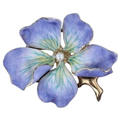 Broche fleur vintage en or 14 carats et émail violet