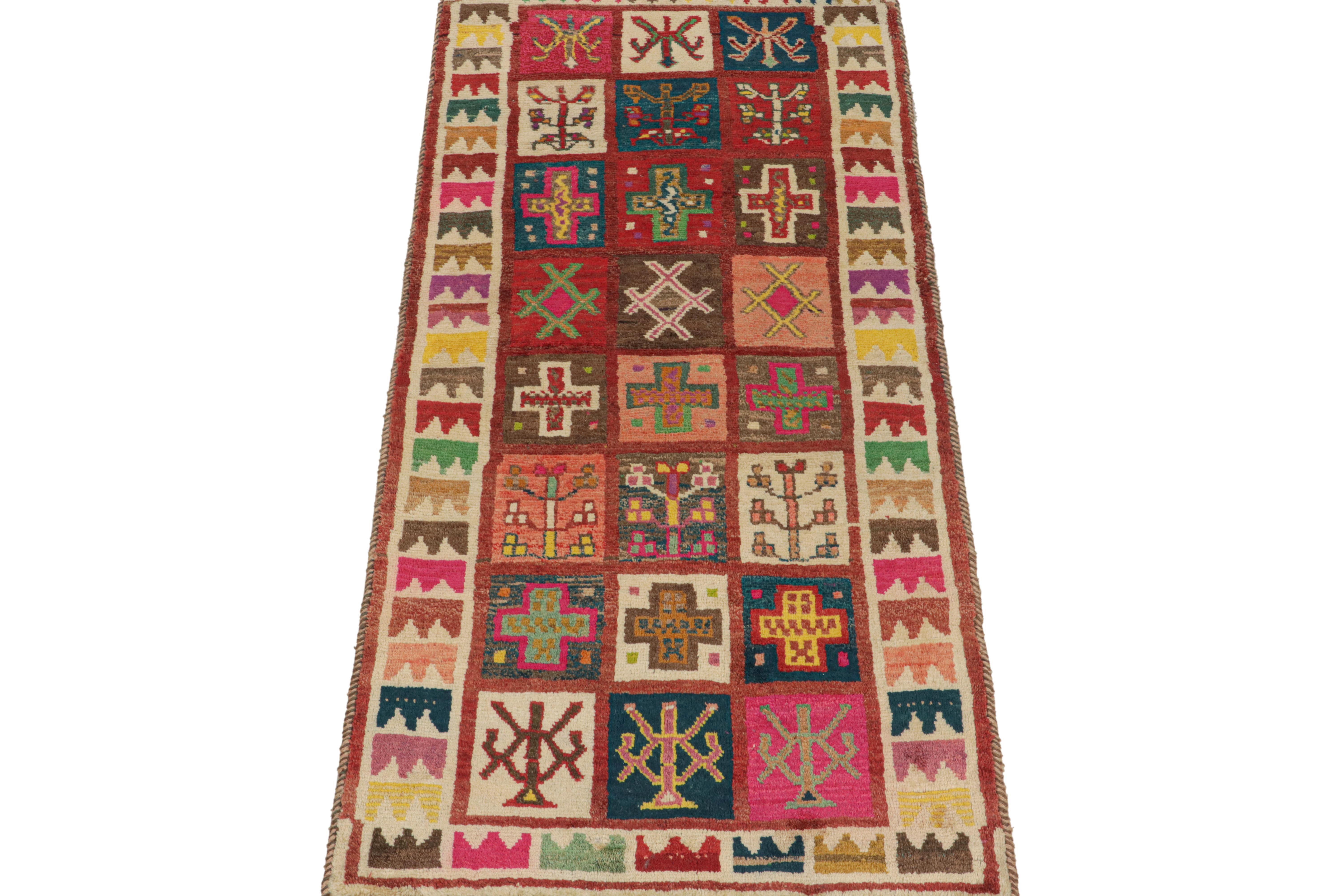 This vintage 3x8 Persian runner is a Gabbeh rug that originates from the Qashqai tribe—hand-knotted in wool circa 1950-1960.

Its design hosts a variety of primitivist geometric patterns—its field motifs within squares while its border patterns