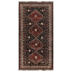 Tappeto persiano vintage Qashqai nero con medaglioni - Rug & Kilim