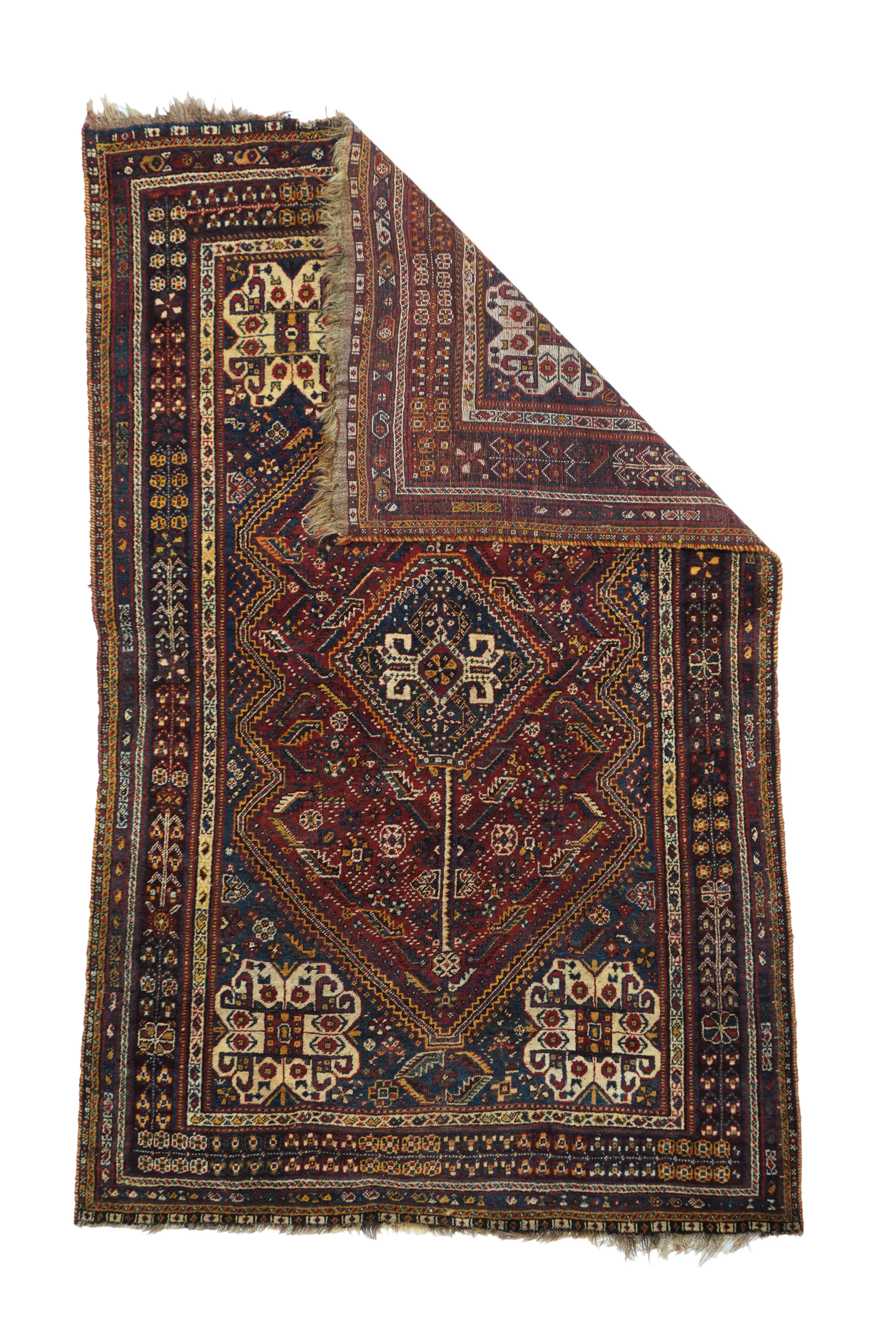 Vintage Qashqai Rug 5' x 8'2''. Fars province, SW Persian, with a dep blue field, four elaborate knot-medallions in the corners, and a central 