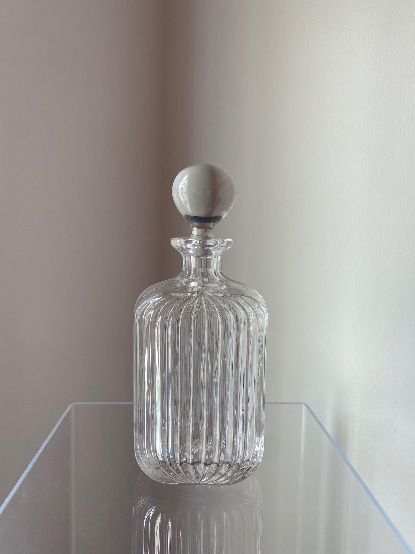 Beautiful, architectural and unique crystal decanter by Villeroy & Boch.  This piece is no longer in production and exemplifies the beauty and craftsmanship of Villeroy & Boch.  This crystal piece exudes class and style as it delivers ripples of