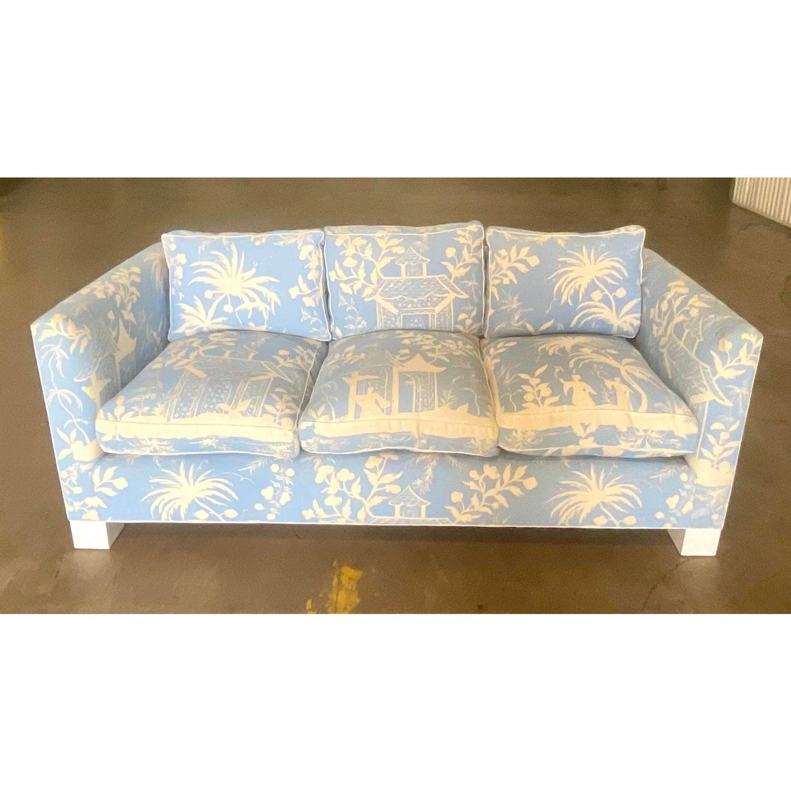 Spectacular vintage custom built Chinoiserie sofa. Done in the coveted Quadrille “China Sea” print. Made especially for the client in a custom pale ice lavender. Down filled with deep seats and clean shape. A breath taking addition to any project.