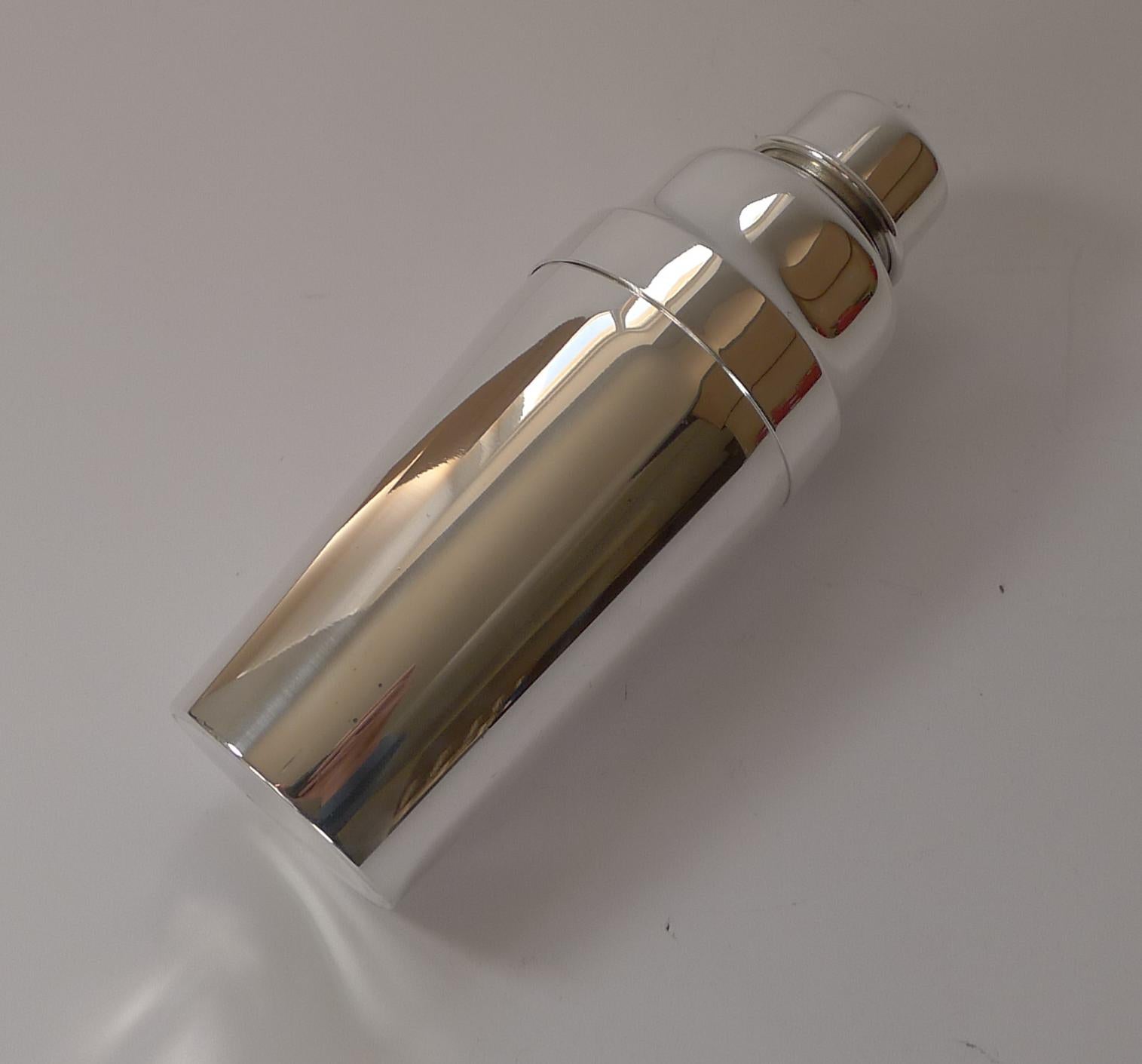 A superb French cocktail shaker just back from our silversmith's workshop having been professionally cleaned and polished returning it to its former glory dating to c.1935.

Christofle is a goldsmith and tableware company, founded in Paris in 1830