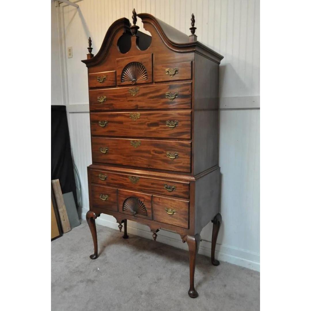Vintage Queen Anne Mahogany Marlboro Manor Highboy Tall Chest Dresser by Sacks. Item features 2 part construction, beautifully carved shell accents, twisted flame finials, long shapely queen Anne legs, 8 dovetailed drawers. Circa Mid 20th