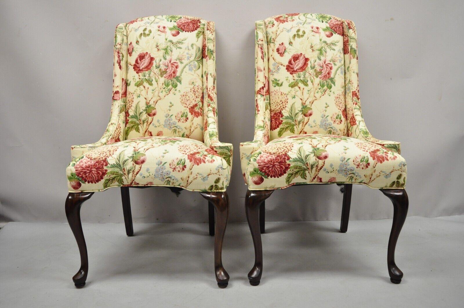 Vintage Queen Anne style cherry wood hiprest dining side chair - a pair. Item features a floral upholstered fabric, solid wood hiprest frames, shapely Queen Anne legs, very nice vintage pair, quality American craftsmanship. Circa late 20th century.