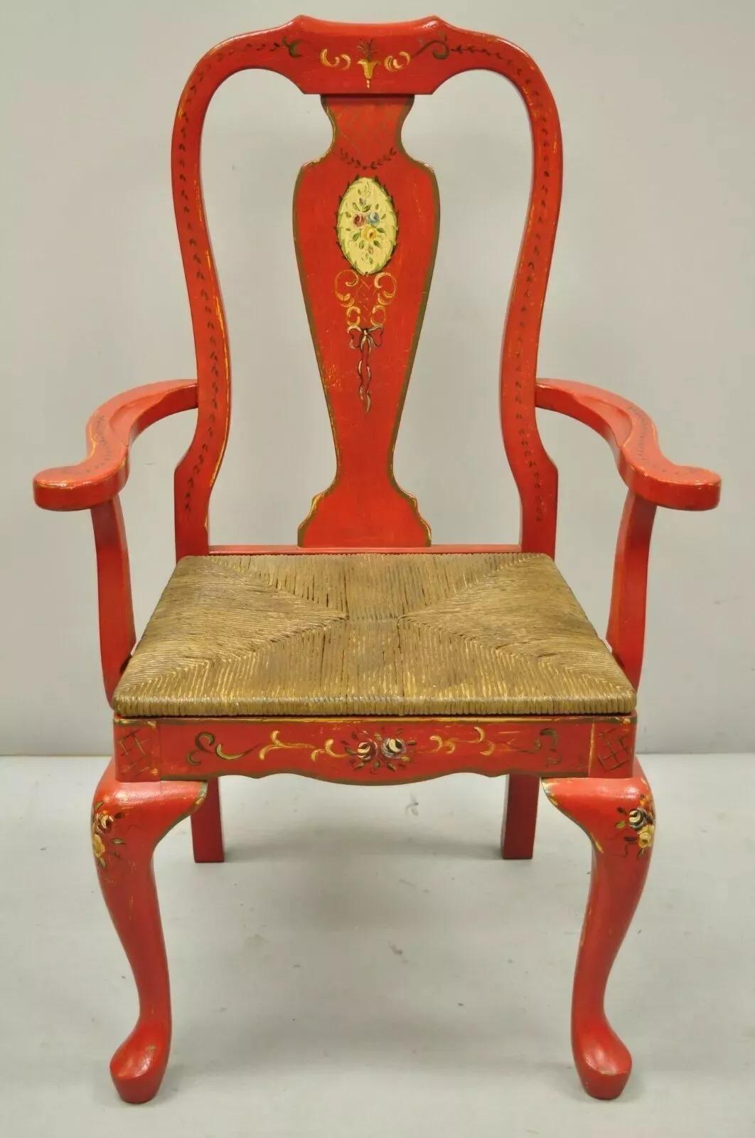 Pair of Vintage Queen Anne Style Green and Red Rush Seat Arm Chairs. Item features rush seats, (1) Green chair, (1) Red chair, hand painted floral accents, Queen Anne legs, solid wood frame, great style and form. Circa Late 20th Century.