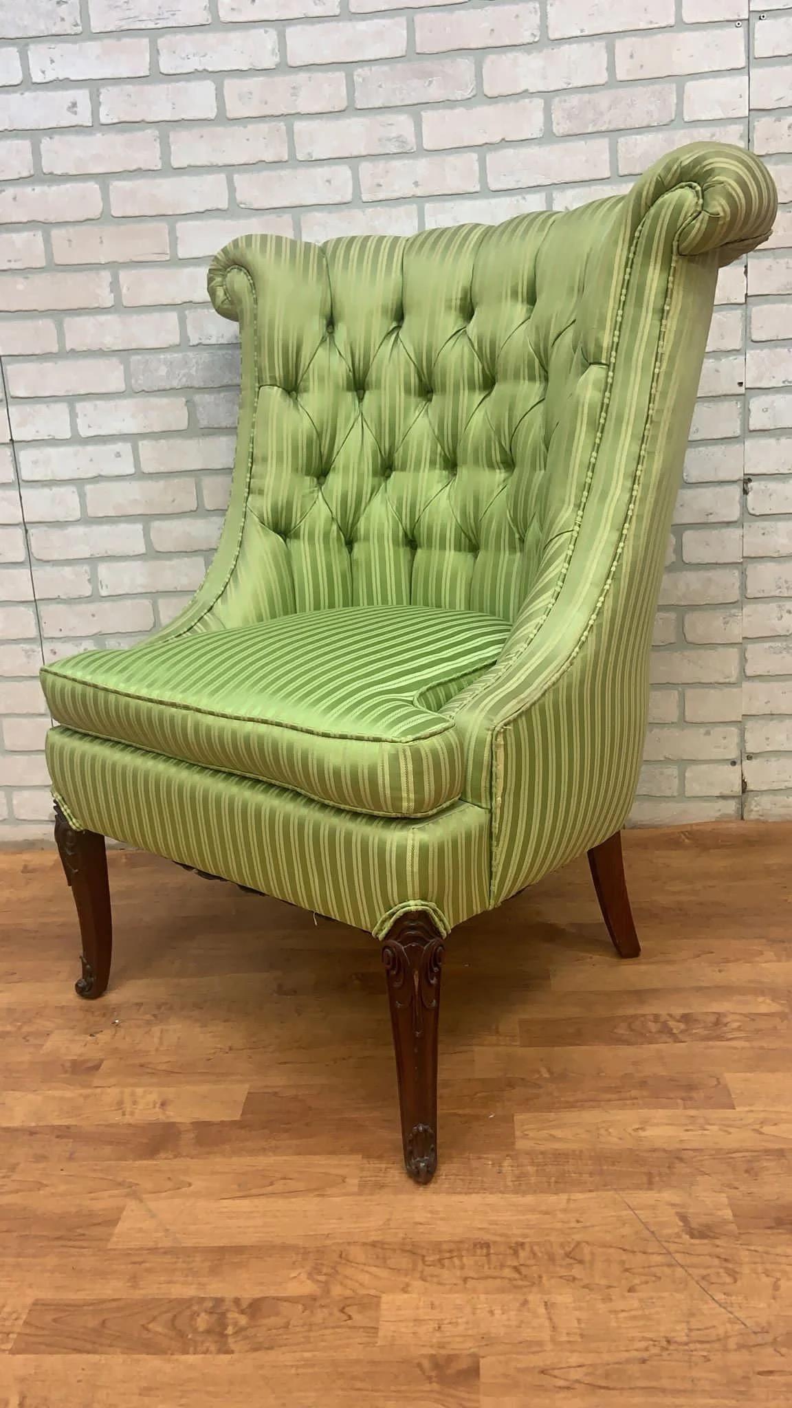 Vintage Queen Anne Style Rolled Back Tufted Wingback Chairs - Pair

These Queen Anne Style Rolled Back Tufted Wingback Chairs showcase a timeless design characterized by their high, winged backrests and curved lines. The green striped fabric