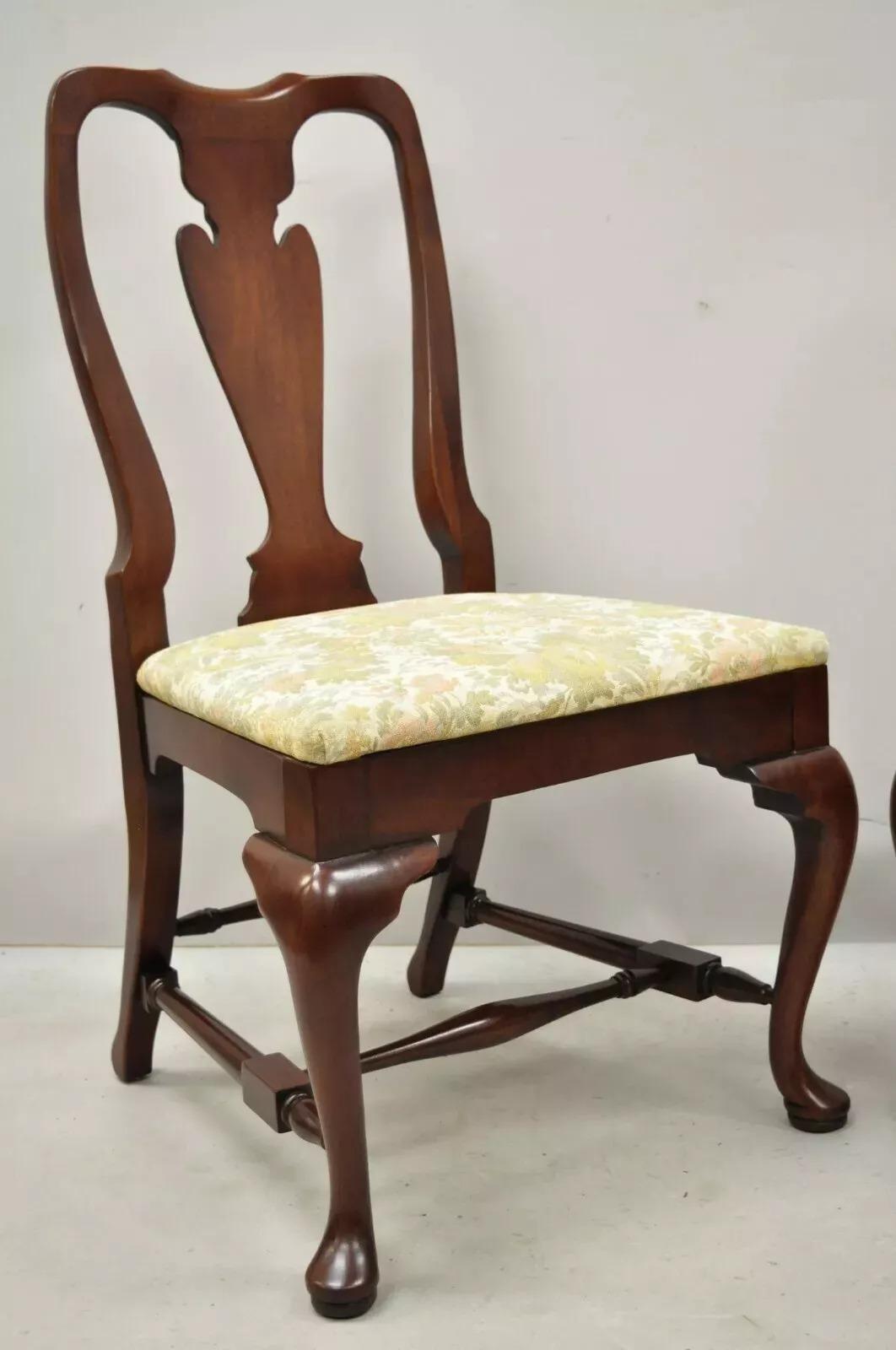 Vintage Queen Anne Style Stretcher Base Cherry Wood Dining Side Chairs - a Pair. Item features solid wood construction, beautiful wood grain, shapely Queen Anne legs, quality American craftsmanship. Circa Late 20th Century. Measurements: 38