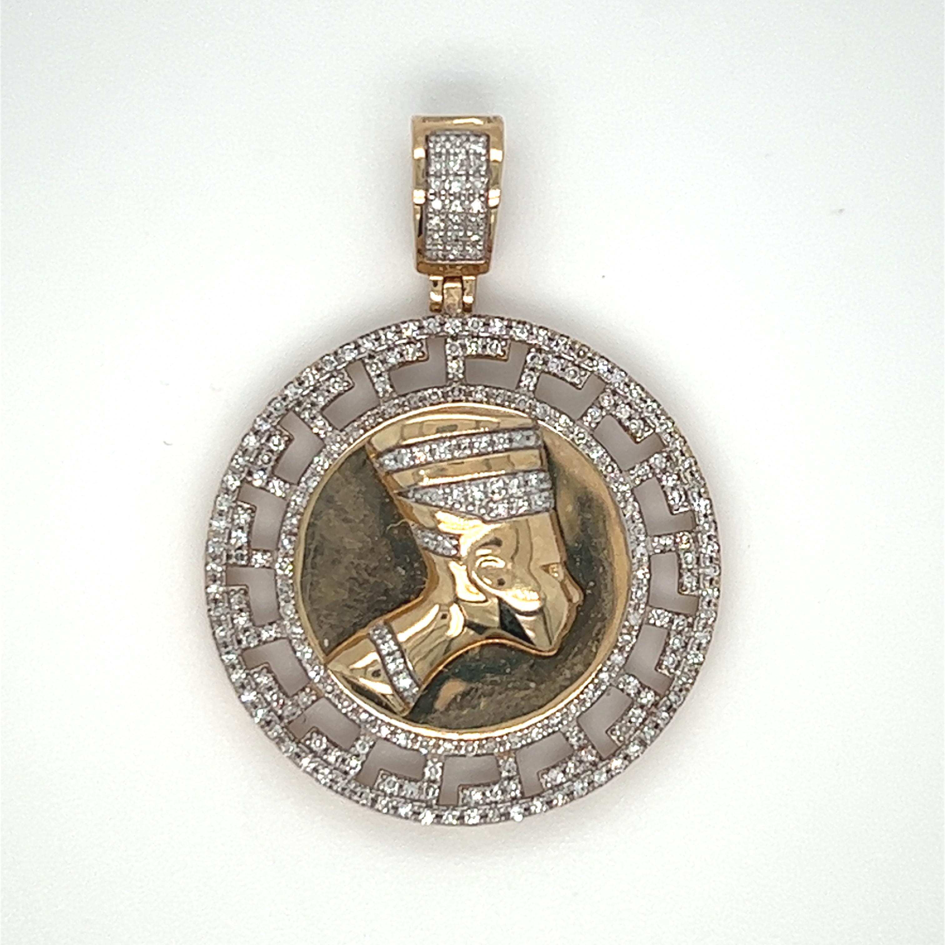 The Queen Nefertiti Pendant, a symbol of the beauty, power and regality that lies within us. The pendant weighs 4.3 grams and has small diamond total weight of 1.25 carats. This pendant makes a wonderful and meaningful gift.  10K yellow gold, signed