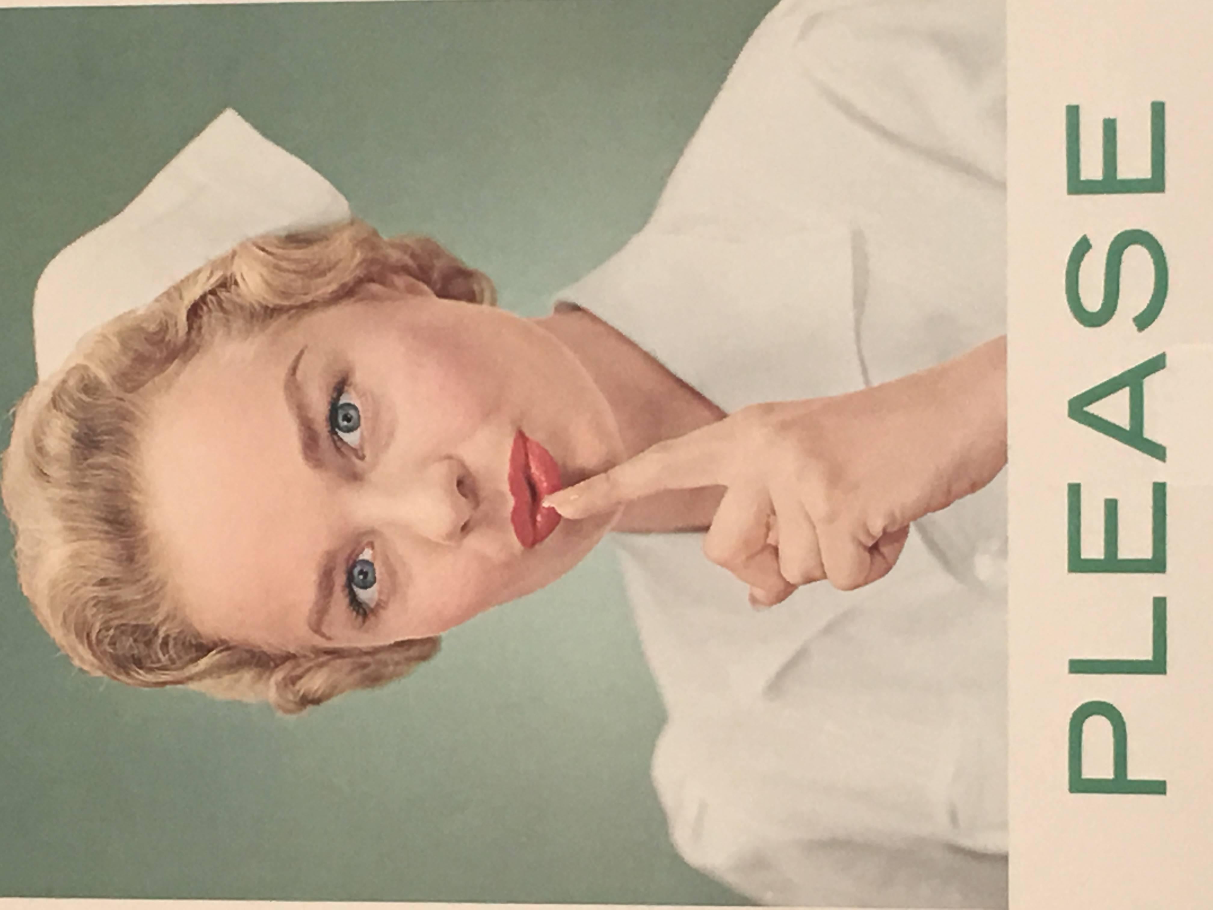 A vintage Quiet Please sign from a hospital, featuring an attractive and well groomed nurse in her white uniform, admonishing visitors to be quiet, with her wide blue eyes and one finger in front of her ruby red lips on a sage green background with