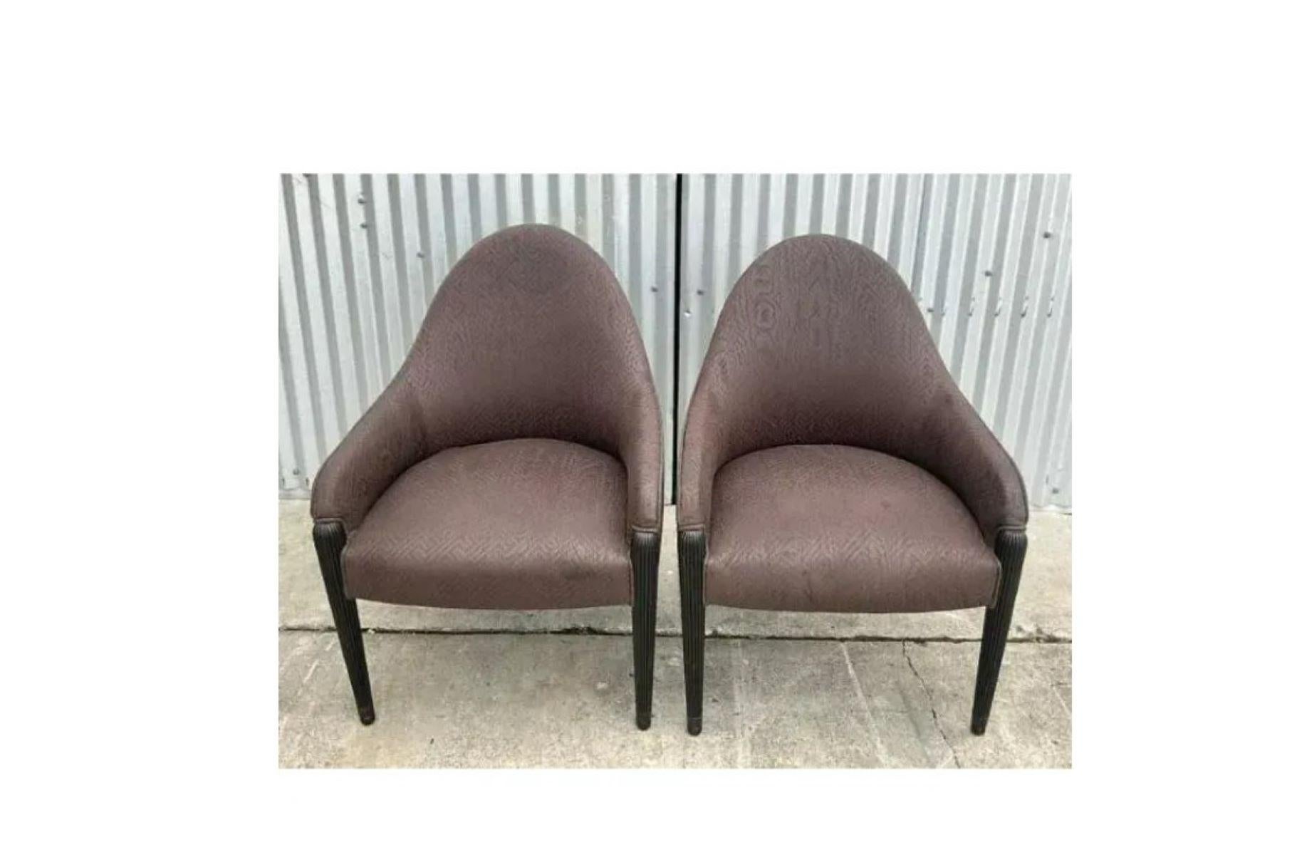 Fantastic pair of vintage quilted brown side chairs. A beautiful sloped high back gives these chairs a distinctive Postmodern look. Done in the manner of the iconic Donghia. Acquired from a Palm Beach estate.