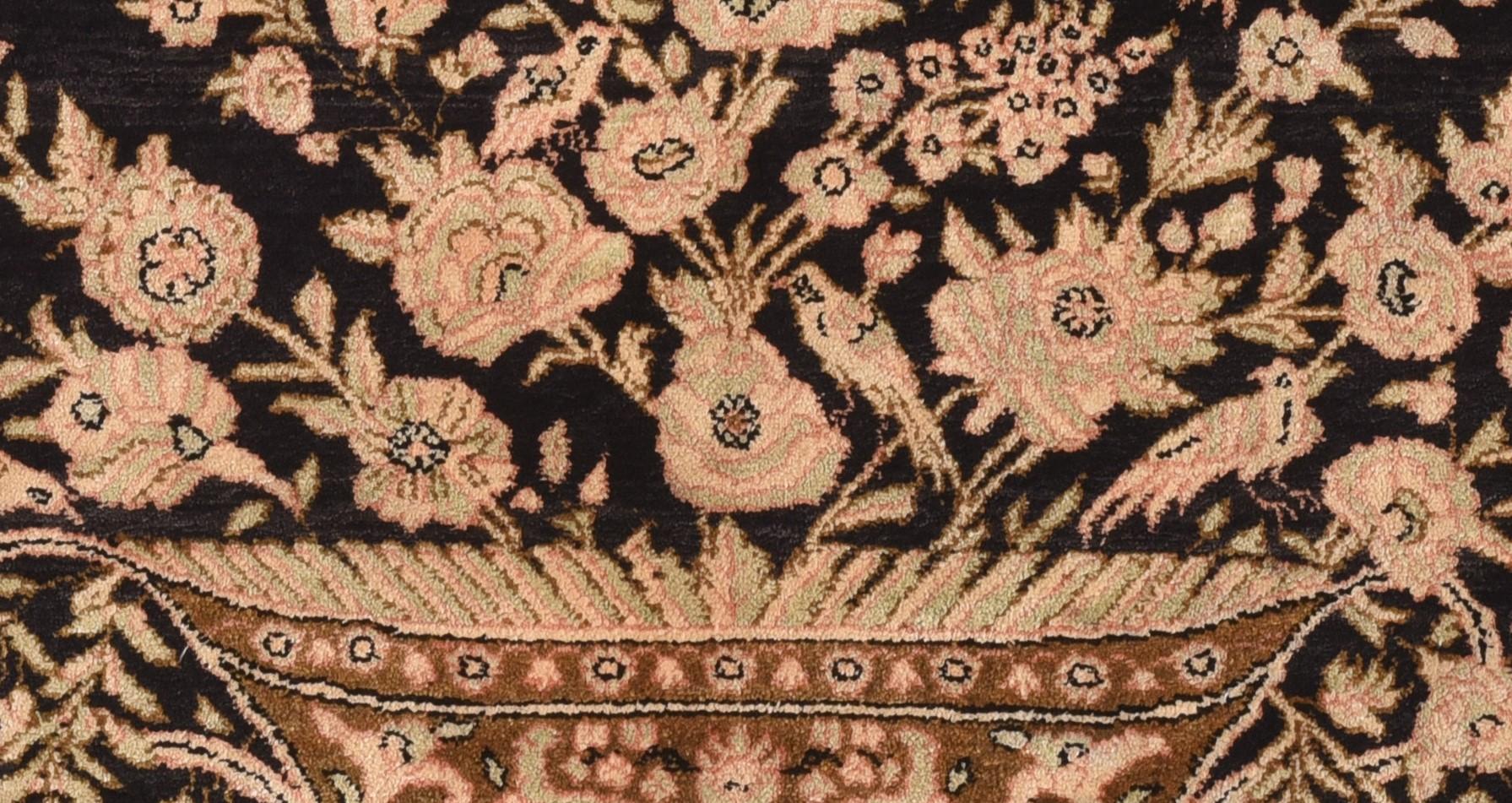 Vintage Qum rug 2'4'' x 2'9''. This finely constructed, short-warp city piece shows a navy, pendanted elliptical medallion with a straw acanthus edge, filled with little leaves and profile ragged petal palmettes, with corner roses and four rosette