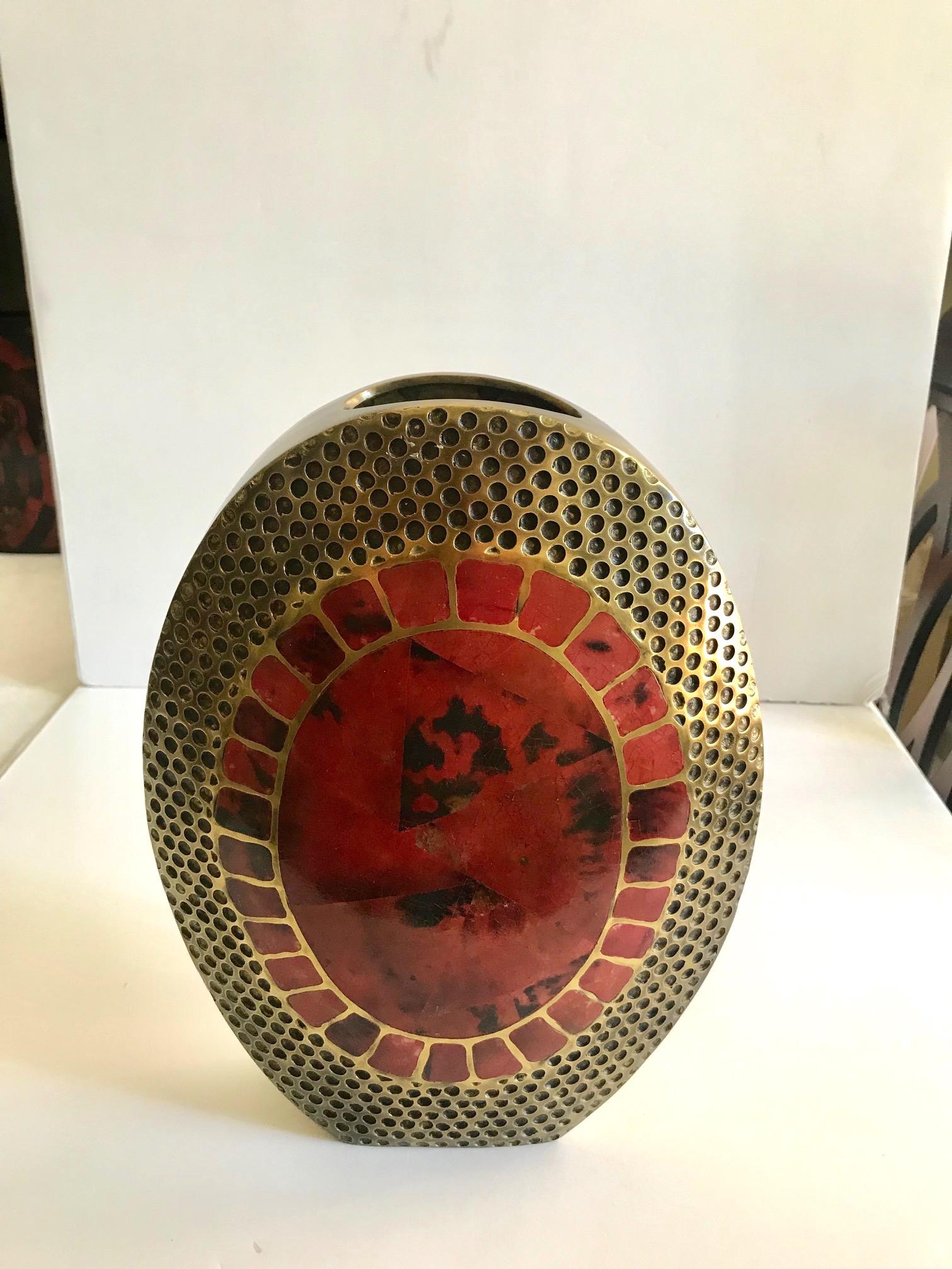 Exquisite organic modern large vase with ovoid form. Vase is comprised of hand forged bronze metal with mosaic inlays of lacquered pen-shell in red and black. The geometric designs are featured on the centre of vase on either side. Bronze has