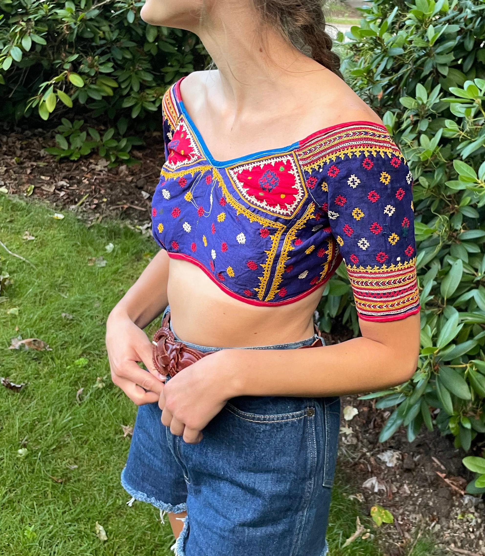 These vintage embroidered choli tops are incredibly rare and special: their ages range from the early to mid 20th Century, and all of them were embroidered by hand by the Rabari people in what is now Northwest India. The Rabari people are an ethnic