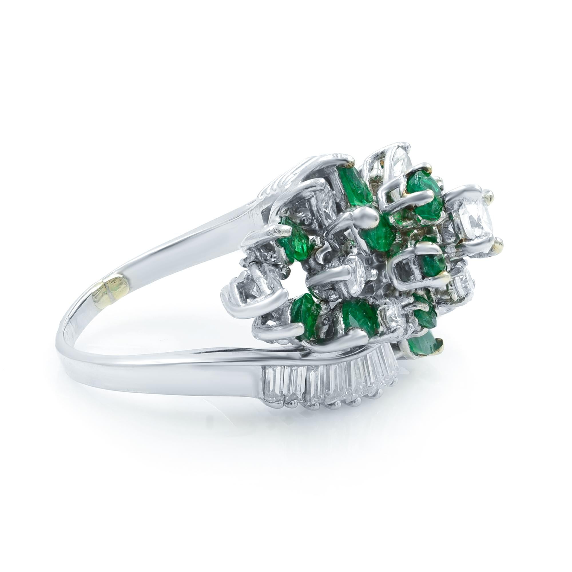Seven bright white and sparkling marquise-cut diamonds, totaling 1.30 carats, mixed up with as many bright rich green emeralds in this strikingly beautiful cocktail ring, circa 1960s-70s, finely hand-fabricated in platinum. Splashy, flashy and fun!