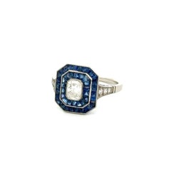 Vintage Radiant Diamond, French Sapphire and Diamond Platinum Double Halo Ring