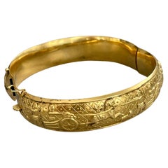 Antique Raised Relief 18 Karat Yellow Gold Bangle