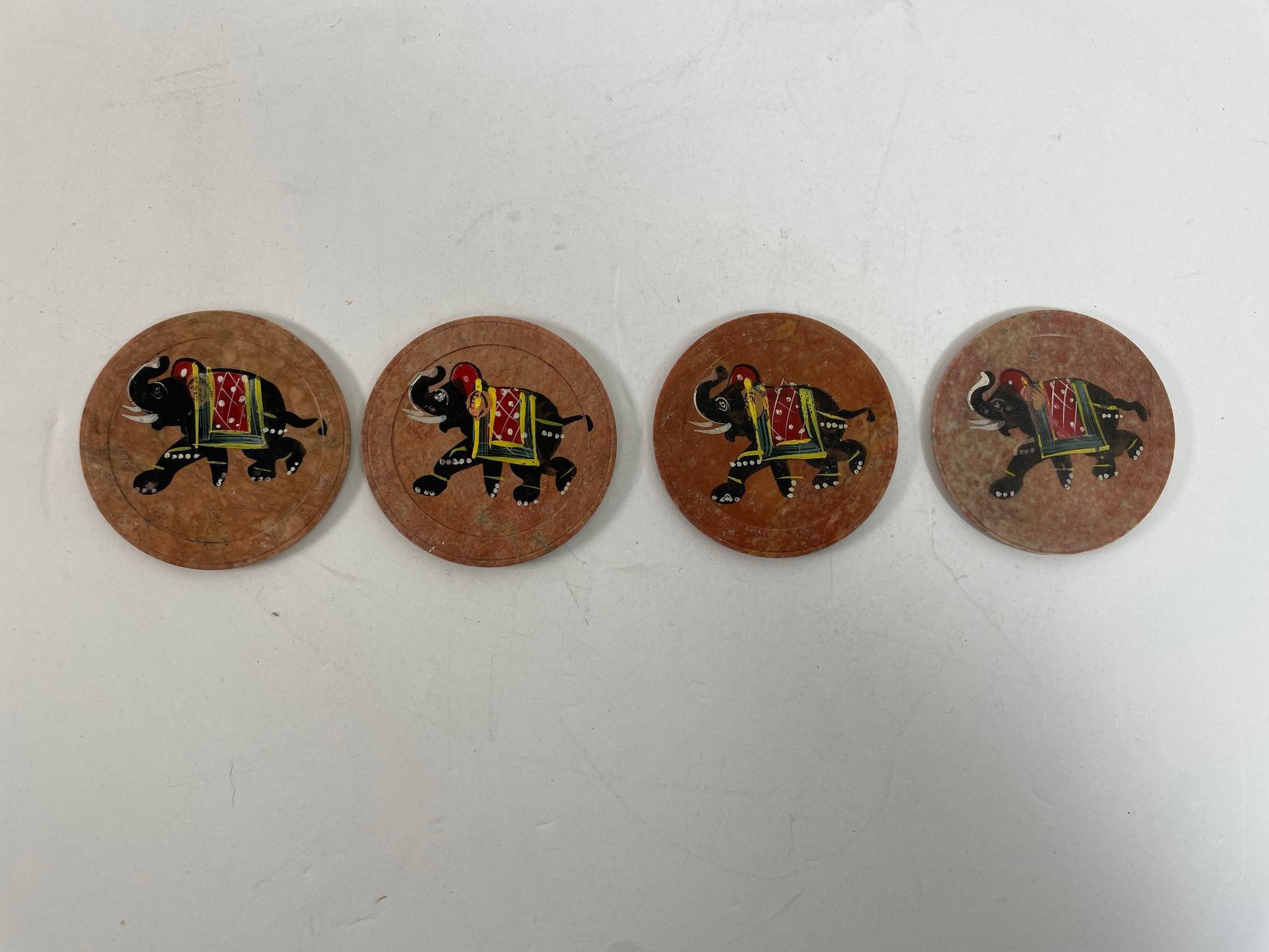 Vintage Rajasthani brown marble stone hand painted with elephants India style coasters.
Rajasthani marble decorative set of 4 small round coasters.
Beautiful handcrafted coasters in marble with elephants design.
Taj Mahal style.
Very nice fine